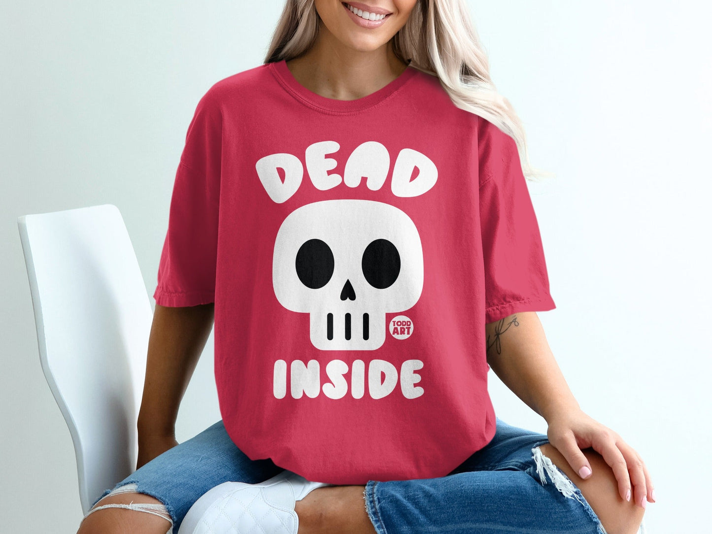 Red t-shirt with skull and "DEAD INSIDE" text.