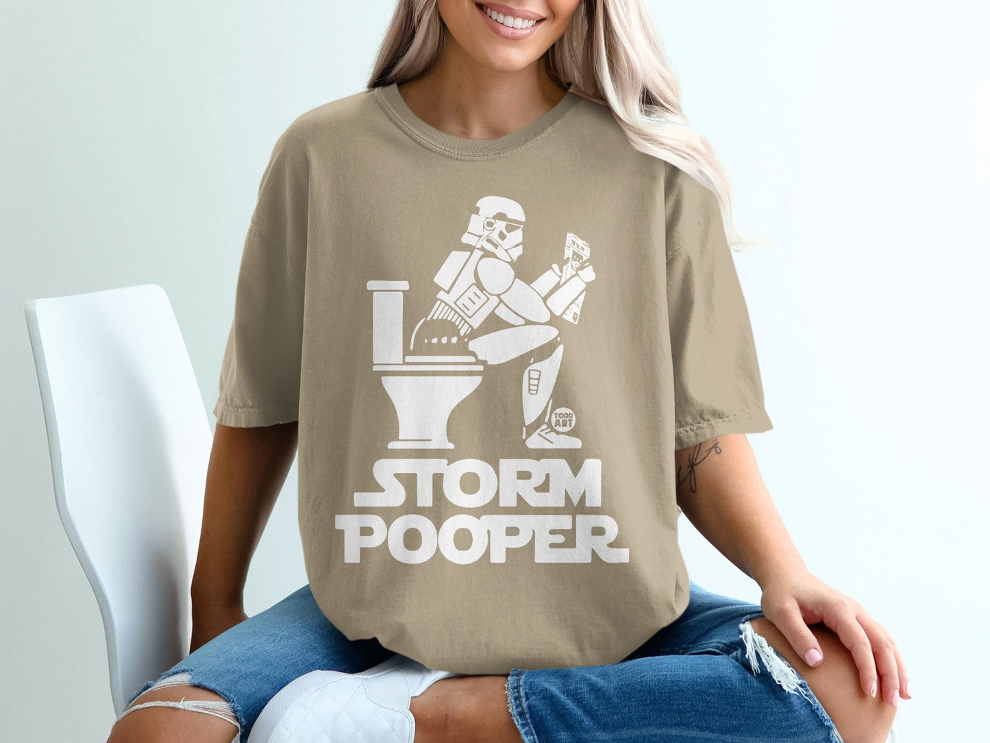 Stormtrooper on toilet with "STORM POOPER" text.