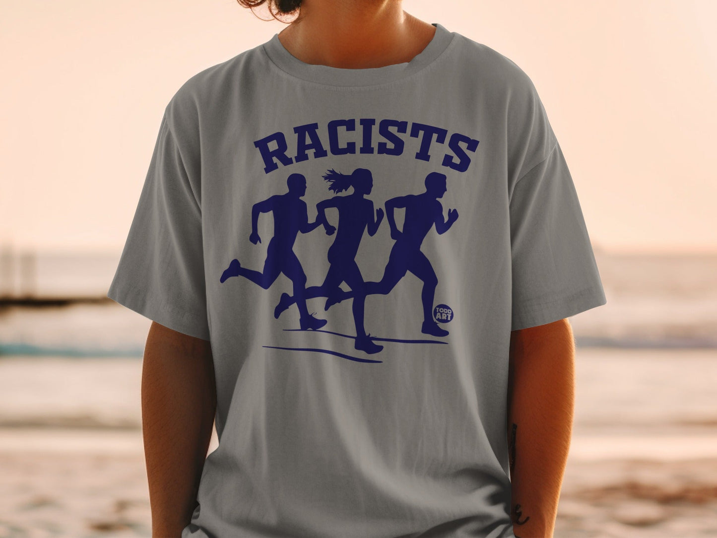 Gray t-shirt with "RACISTS" and three running silhouettes in navy blue.
