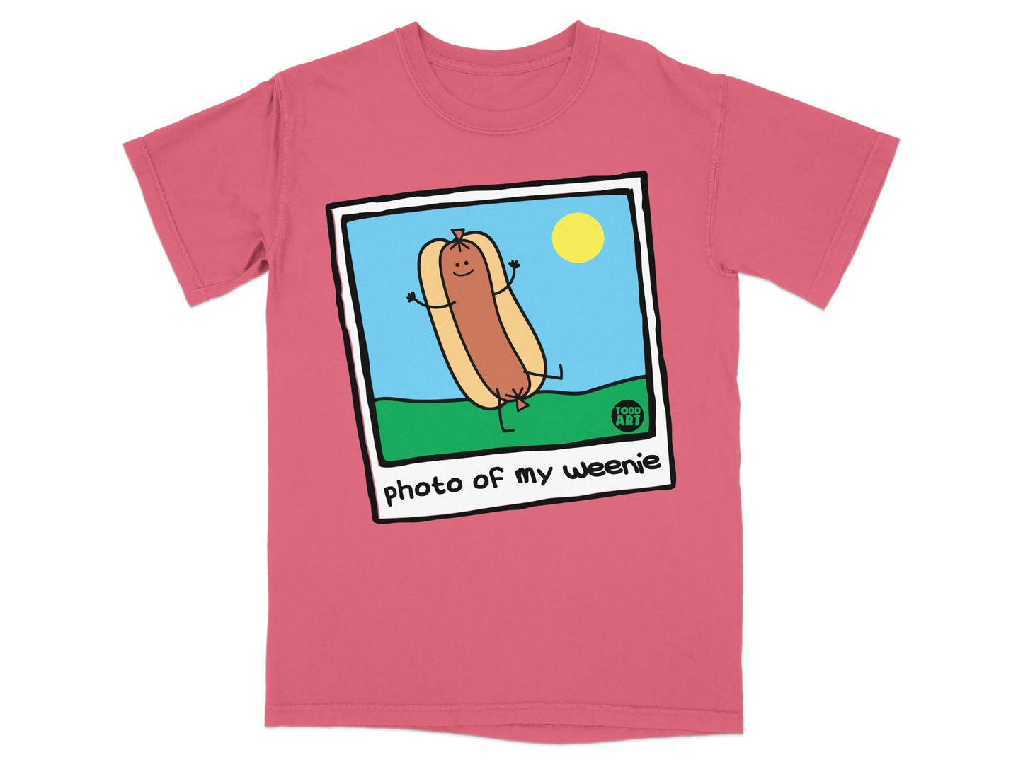 T-shirt with cartoon hot dog in bun on grass, text reads "photo of my weenie".