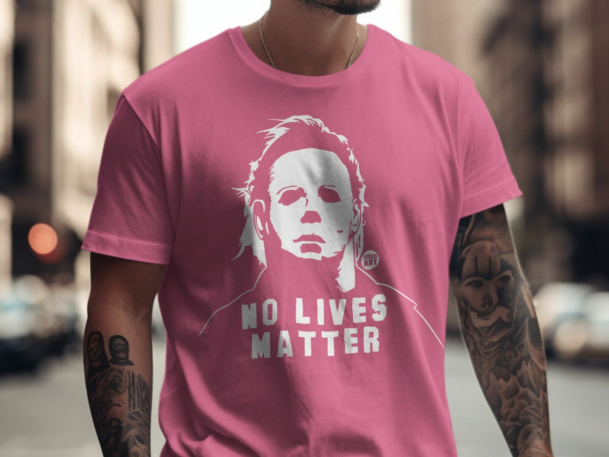 Pink t-shirt with graphic of Michael Myers and text "NO LIVES MATTER".