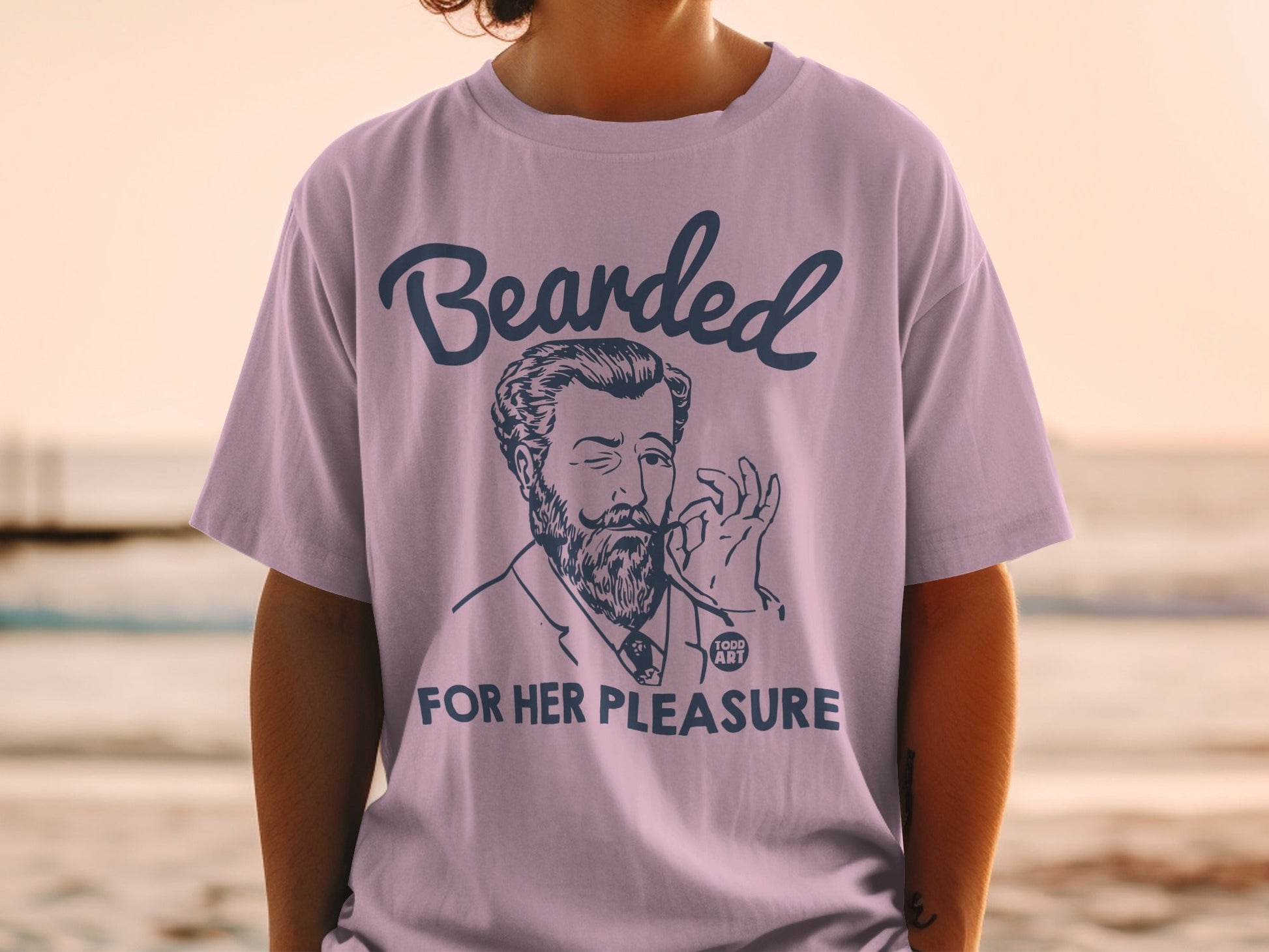 T-shirt with "Bearded For Her Pleasure" and a vintage man illustration.