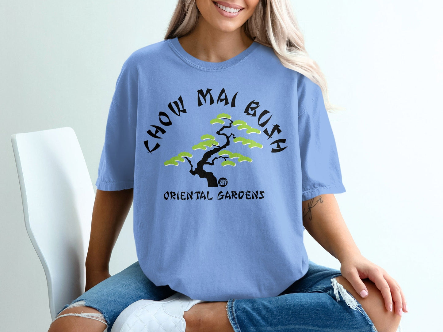 Light blue t-shirt with green bonsai tree and "Chow Mai Busa Oriental Gardens" text.