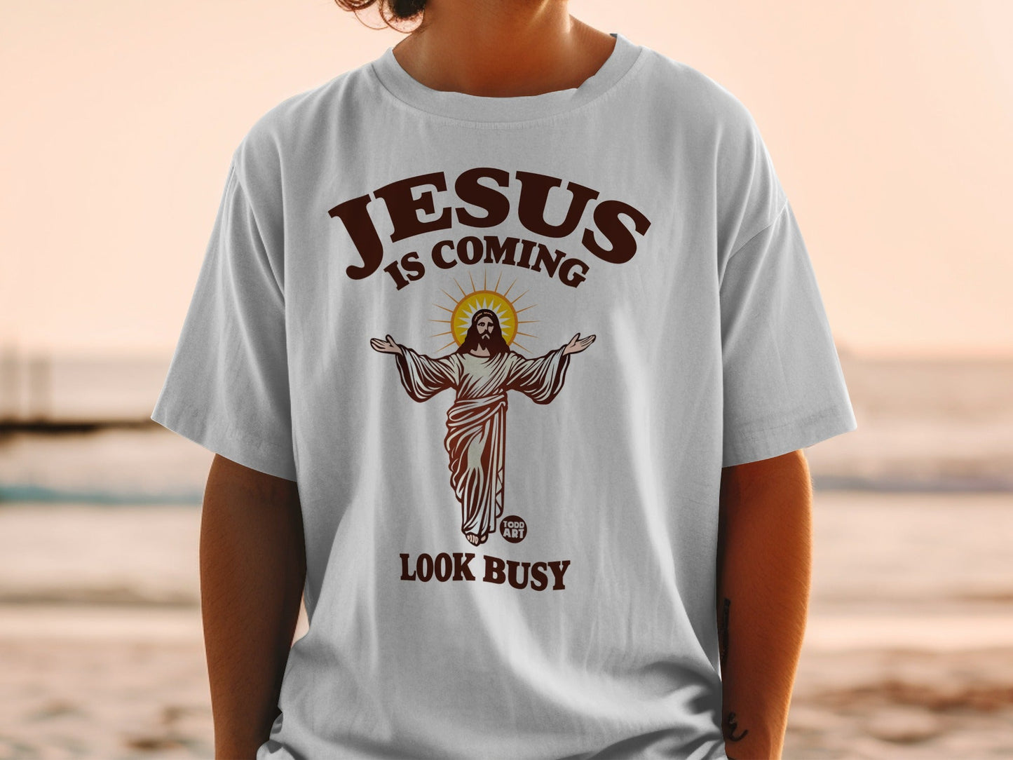 Jesus is Coming Look Busy graphic tee on a person.
