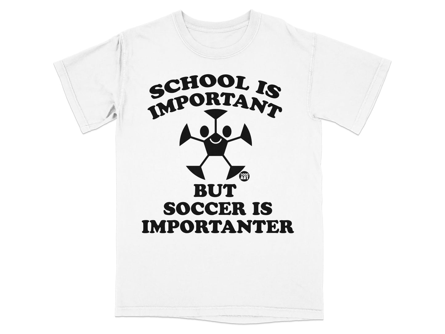 White t-shirt with "SCHOOL IS IMPORTANT BUT SOCCER IS IMPORTANTER" text and soccer ball graphic.