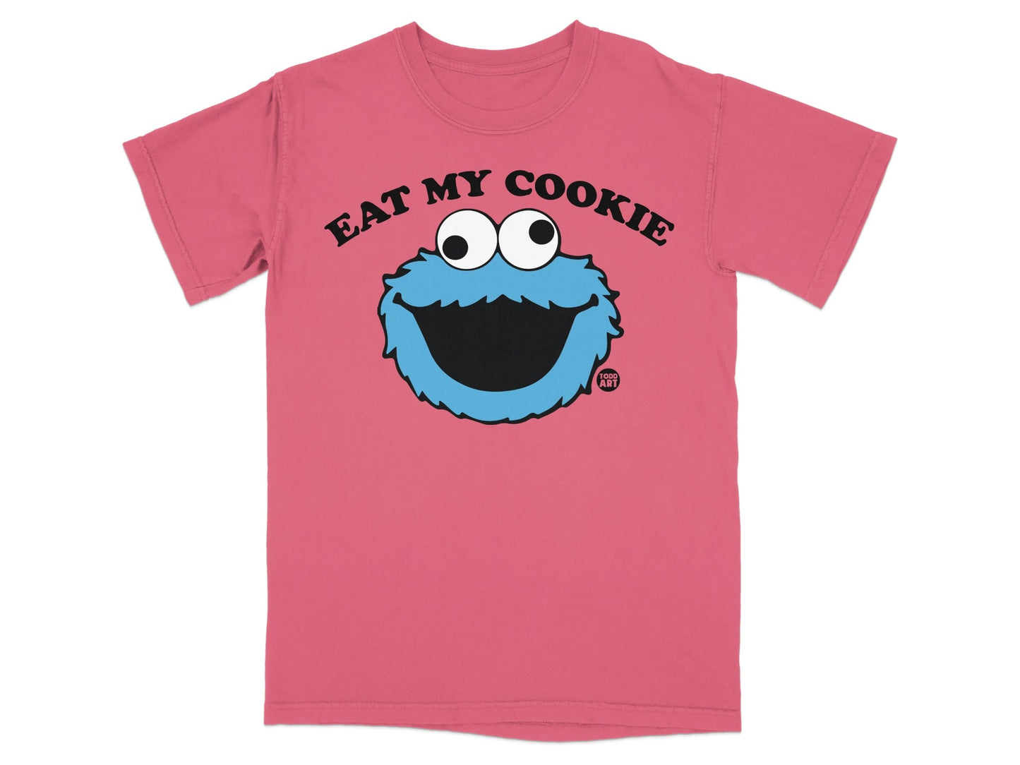 Pink t-shirt with cartoon cookie monster face and "EAT MY COOKIE" text.