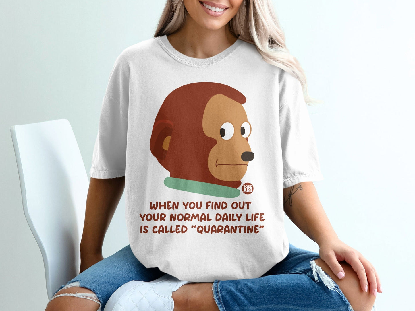 White t-shirt with monkey meme and "Quarantine" text.