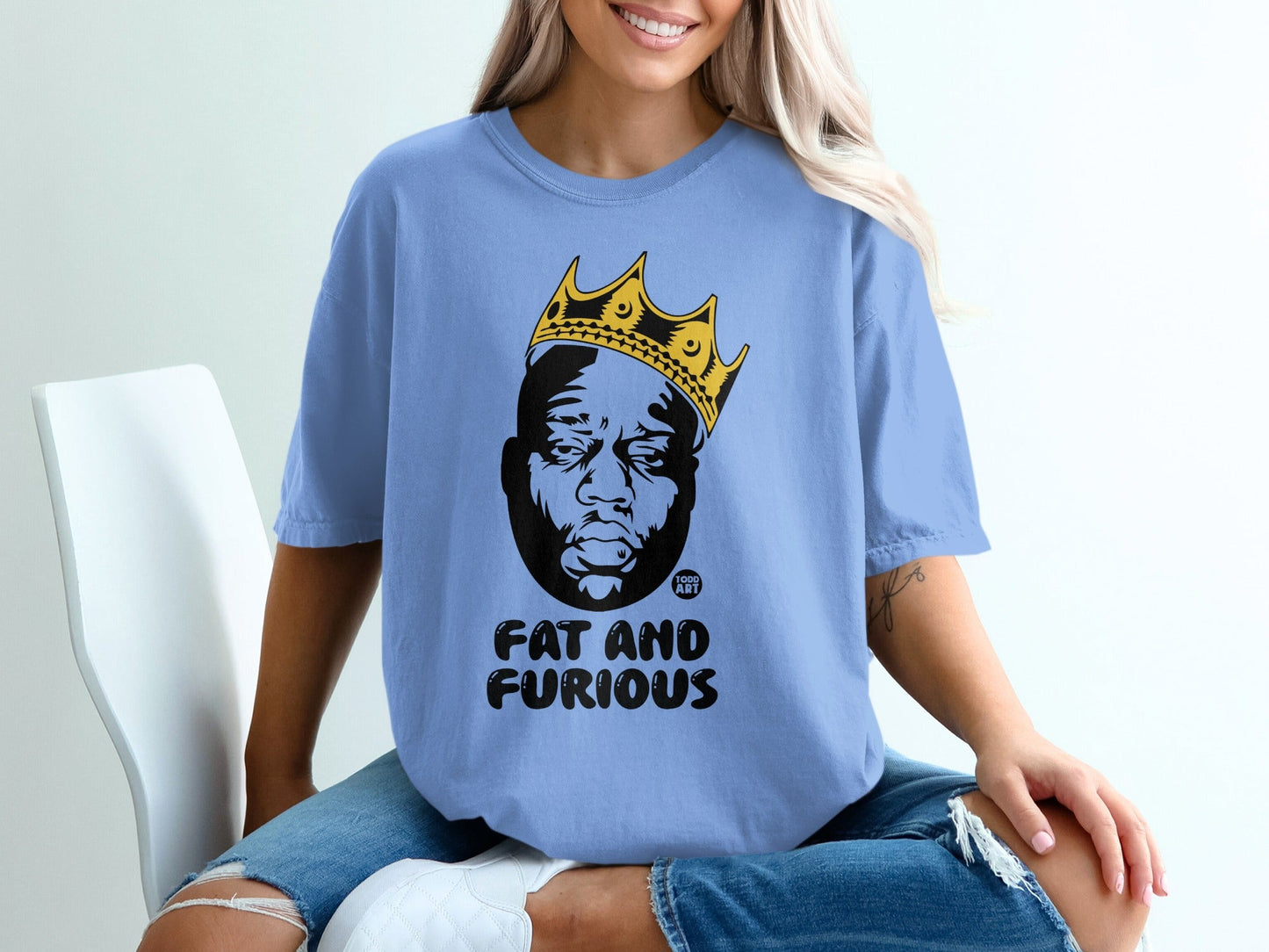 Blue t-shirt with Biggie Smalls portrait and "FAT AND FURIOUS" text.