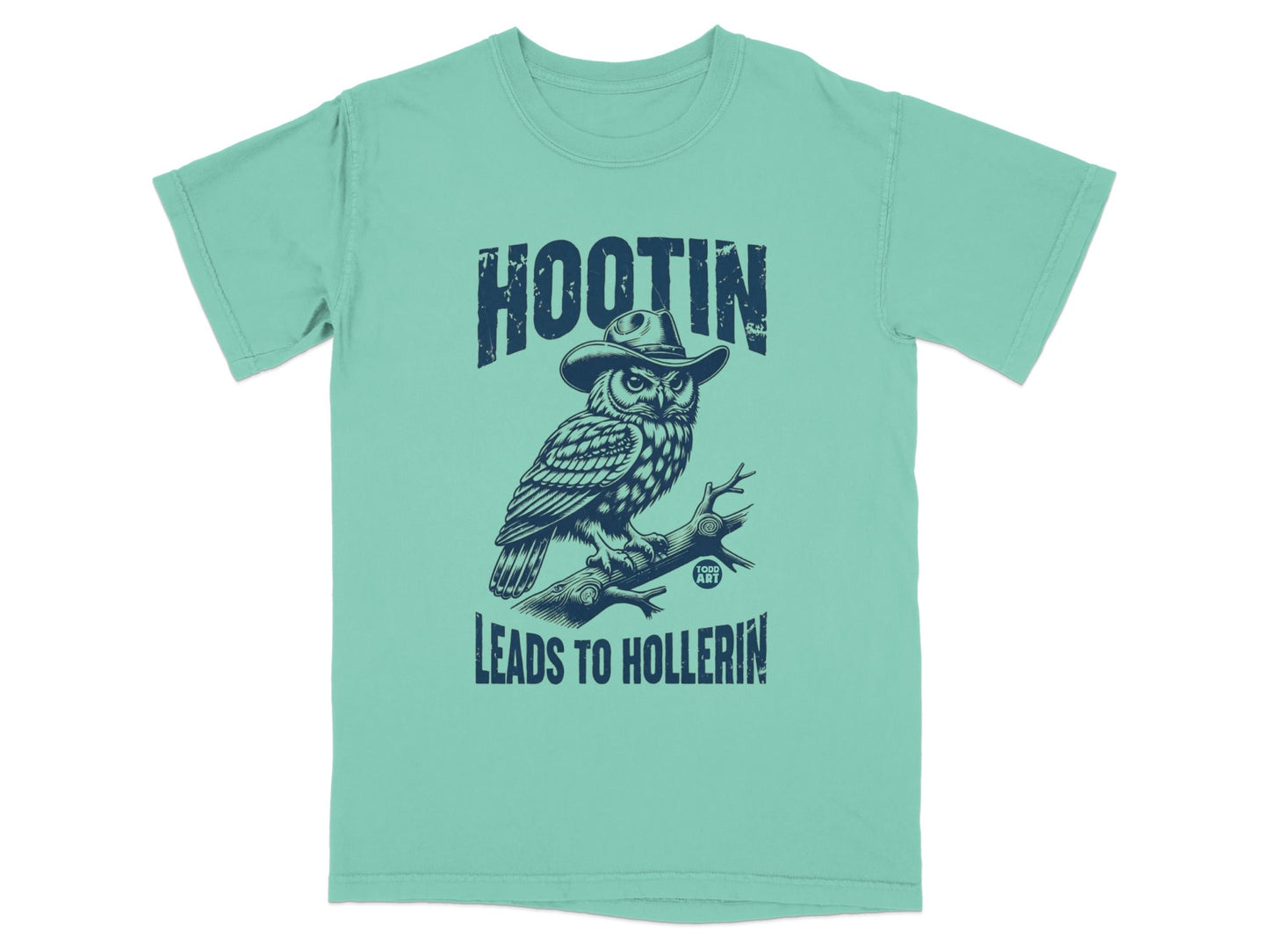Teal t-shirt with owl in cowboy hat, text "HOOTIN LEADS TO HOLLERIN".