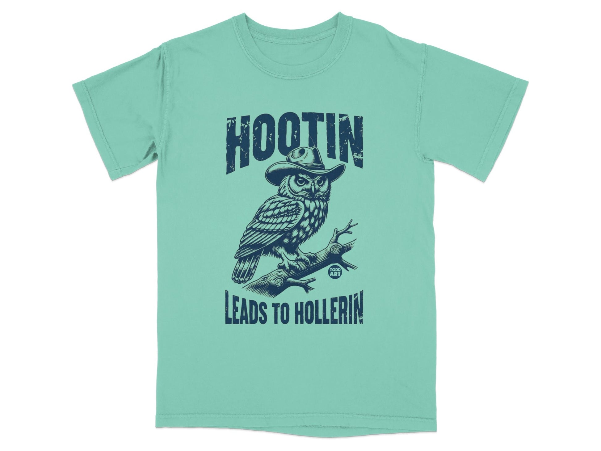 Teal t-shirt with owl in cowboy hat, text "HOOTIN LEADS TO HOLLERIN".
