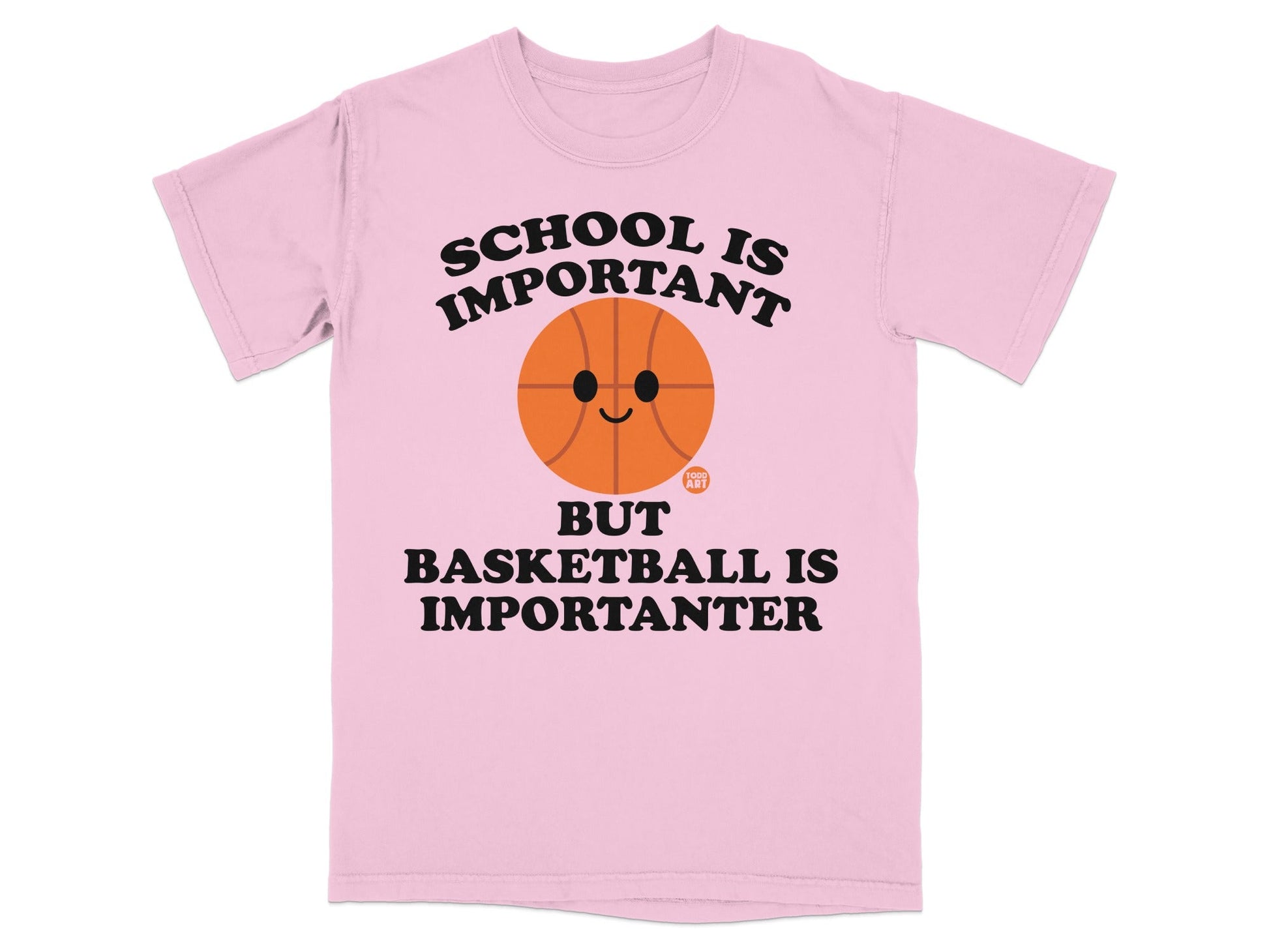 Pink t-shirt with cartoon basketball and text "SCHOOL IS IMPORTANT BUT BASKETBALL IS IMPORTANTER".