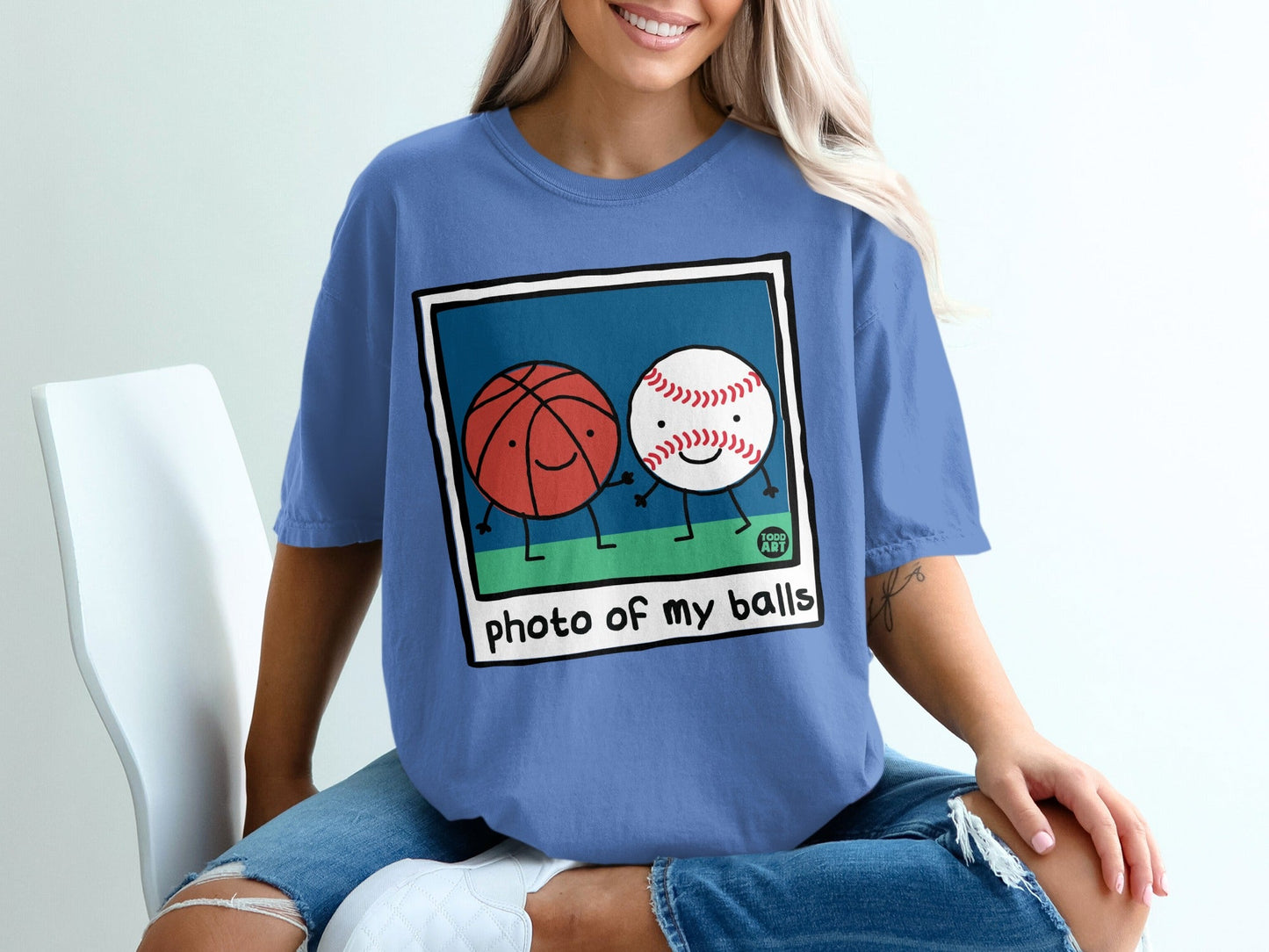 Basketball and baseball characters holding hands with "photo of my balls" text.