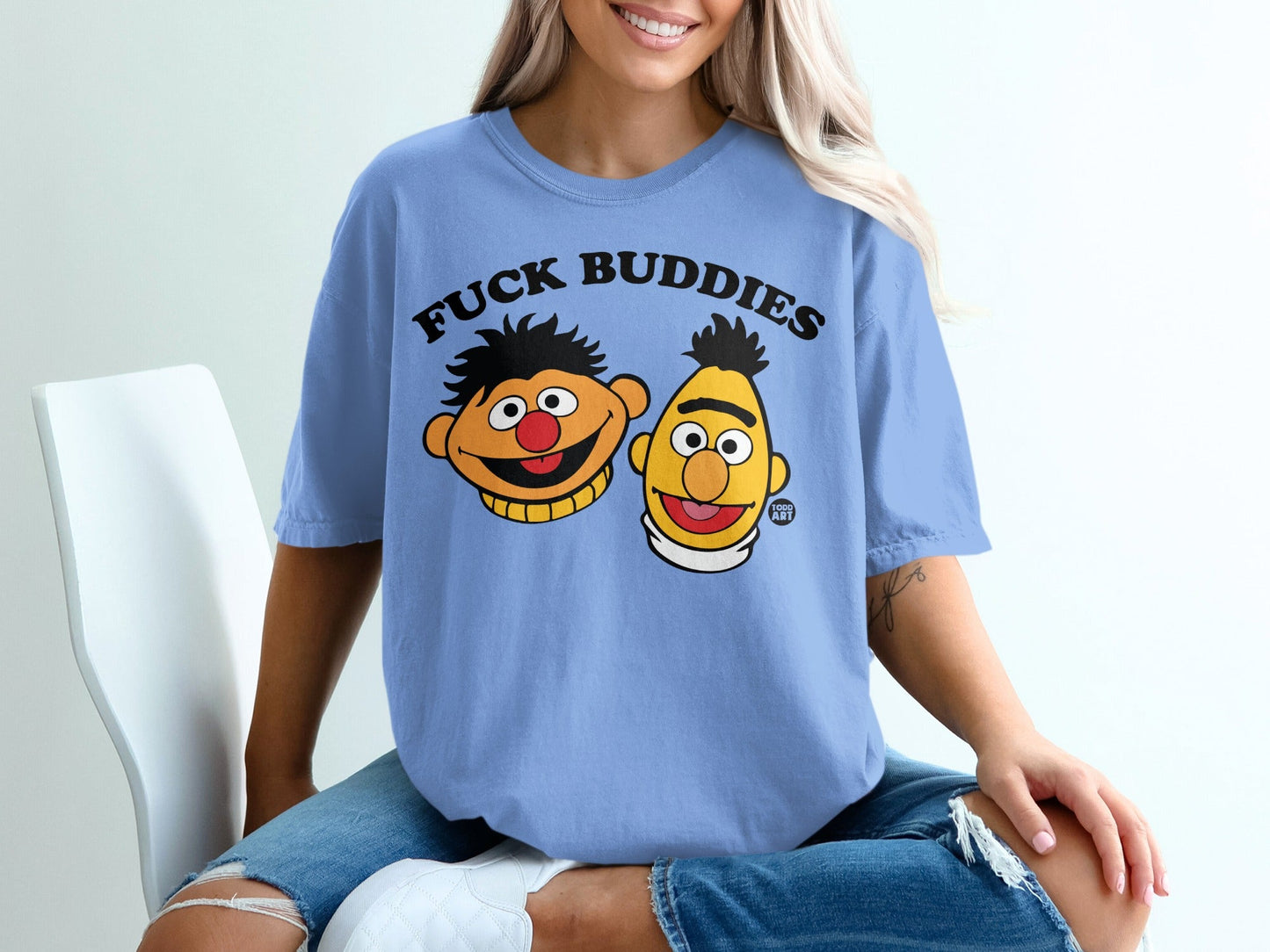 Bert and Ernie from Sesame Street on a light blue t-shirt with "FUCK BUDDIES" text.