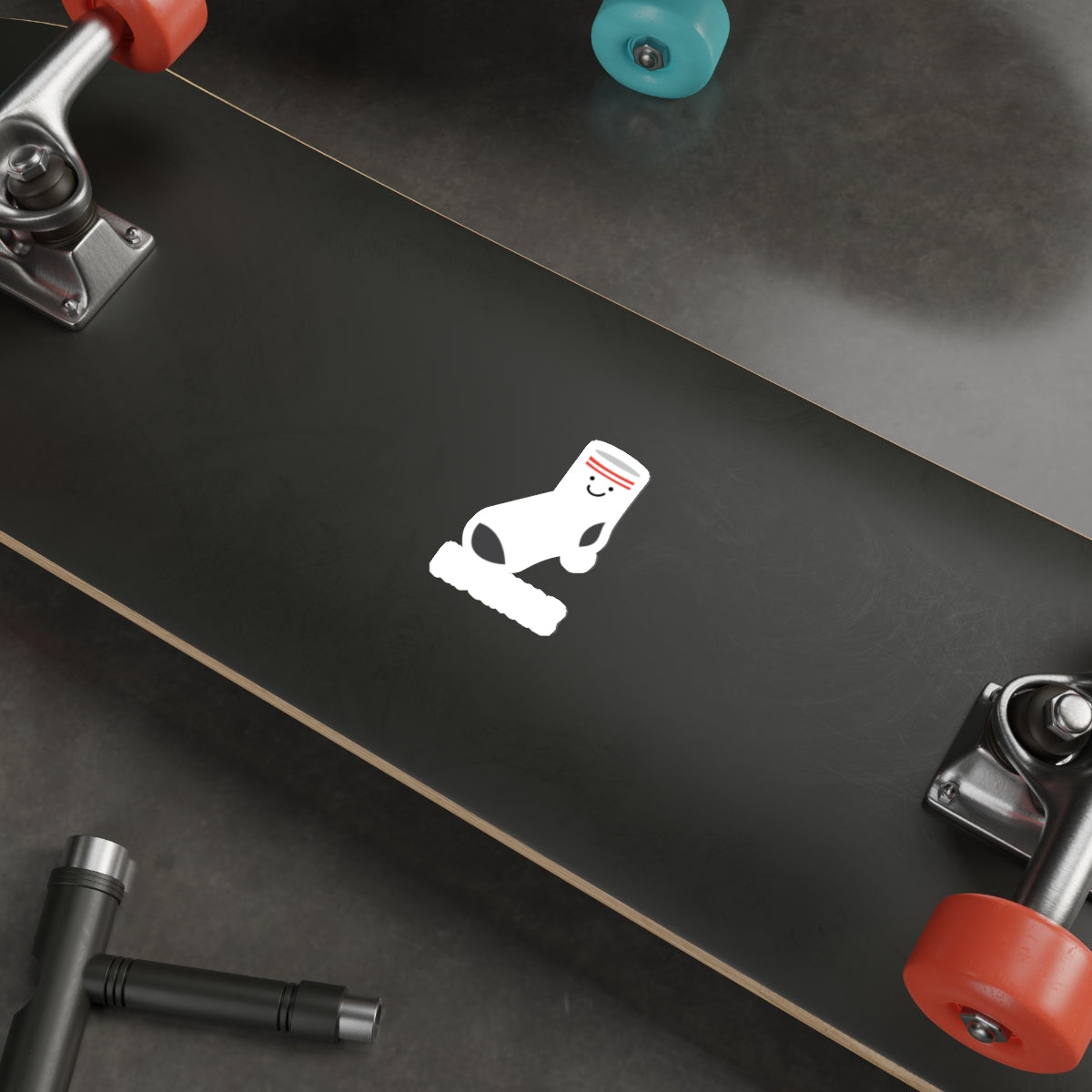 Unique Black Skateboard with Fun Cartoon Graphic Design