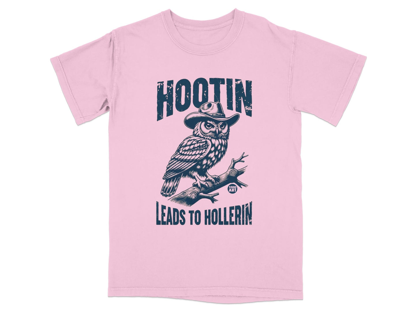 Pink t-shirt with an owl wearing a cowboy hat on a branch.