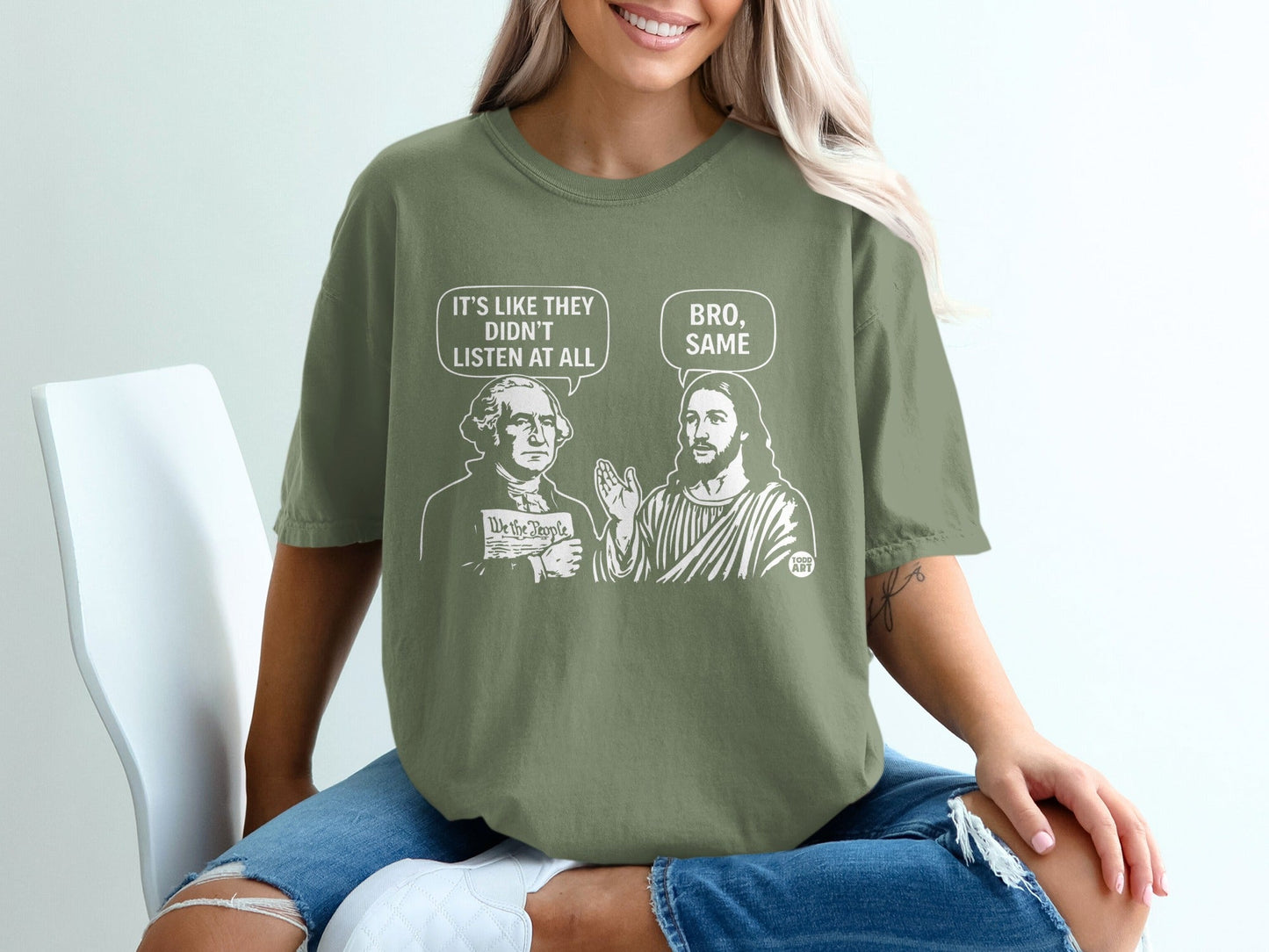 T-shirt with "We the People" and Jesus with George Washington.