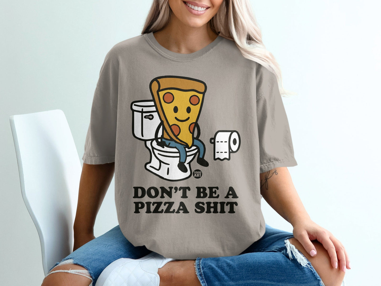 T-shirt with cartoon pizza slice on toilet and text "DON'T BE A PIZZA SHIT".
