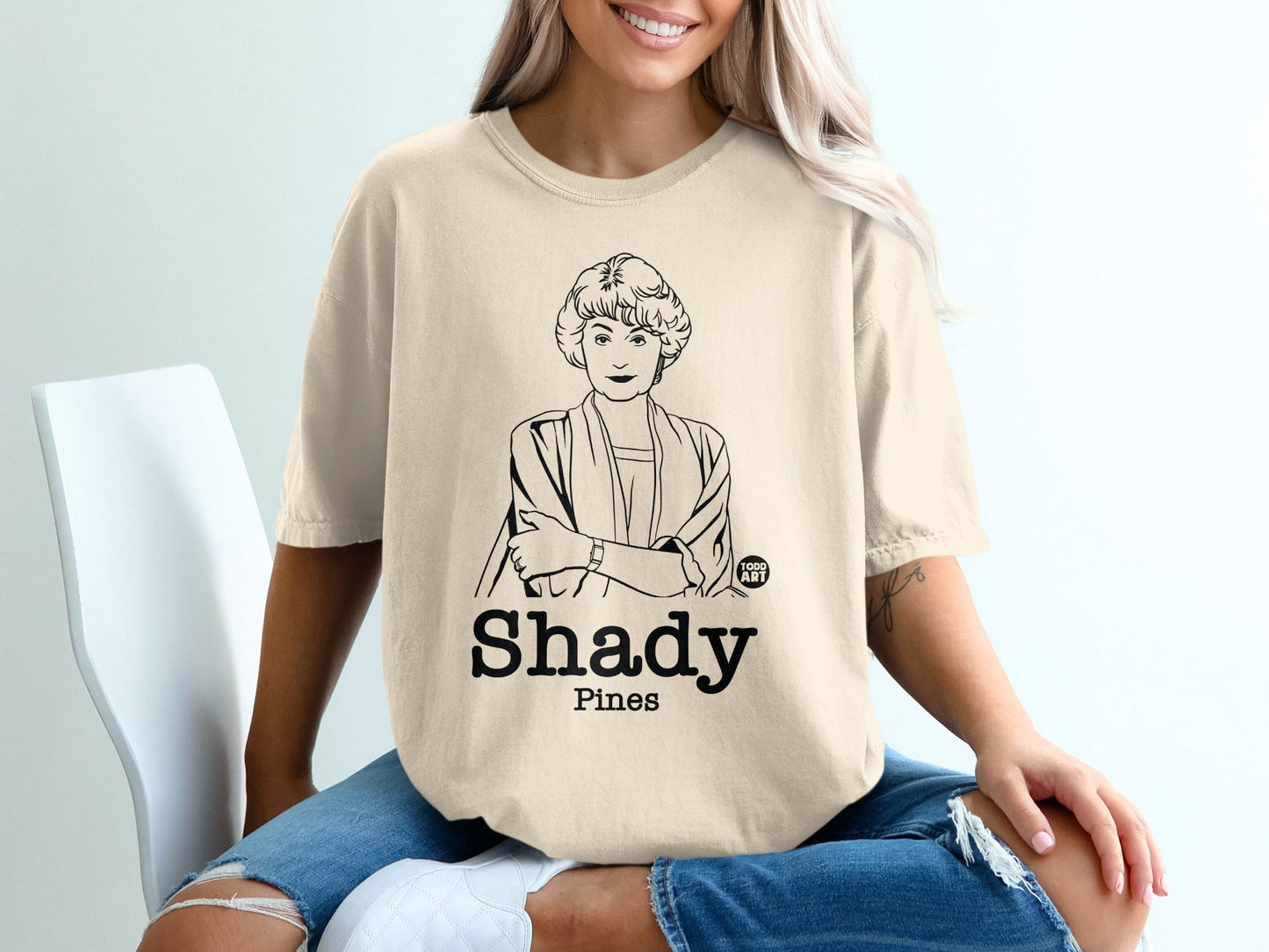Line art of Sophia Petrillo from The Golden Girls on a beige t-shirt.