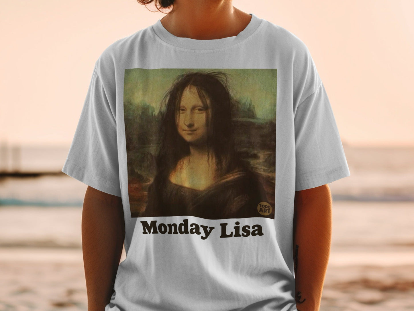 "Monday Lisa" t-shirt with Mona Lisa parody wearing messy hair.