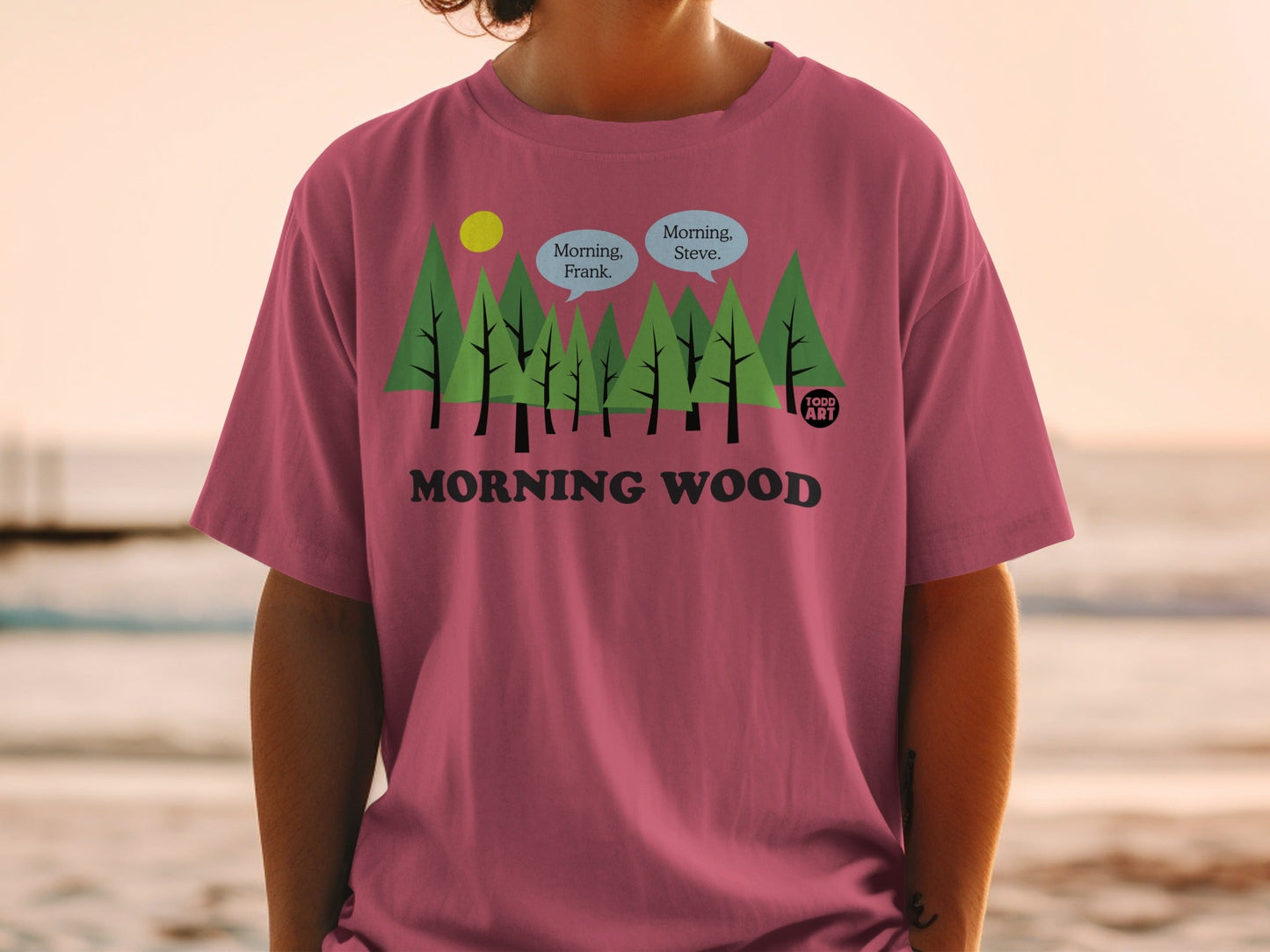 Pink t-shirt with trees, "Morning, Frank," and "Morning, Steve."