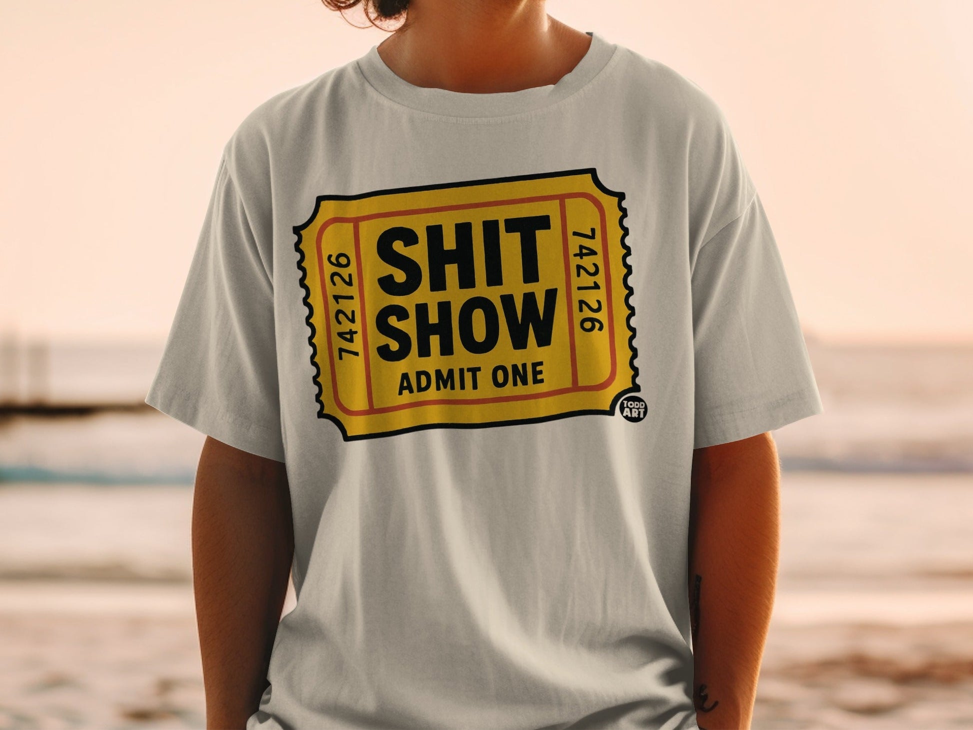 Light grey t-shirt with "Shit Show Admit One" ticket design.