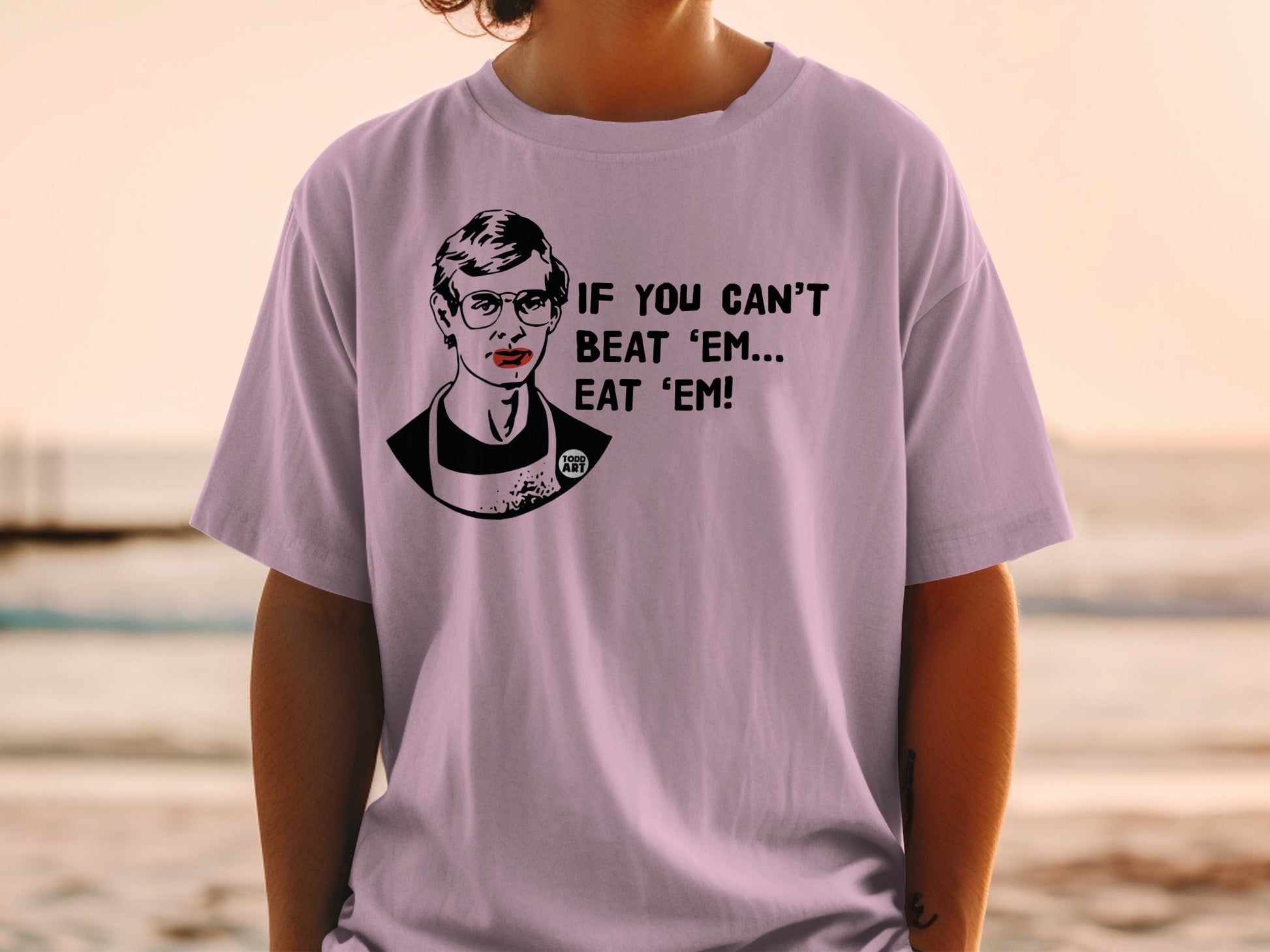 T-shirt with black and white portrait and "IF YOU CAN'T BEAT 'EM... EAT 'EM!"