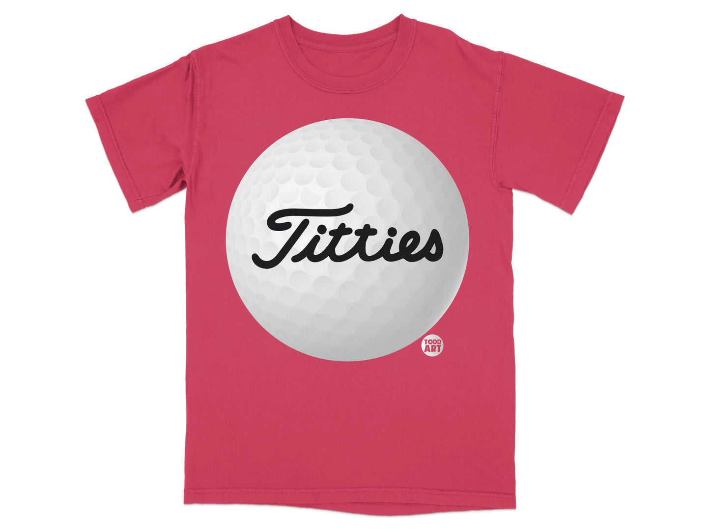 Pink t-shirt with a large white golf ball graphic featuring the word "Titties"