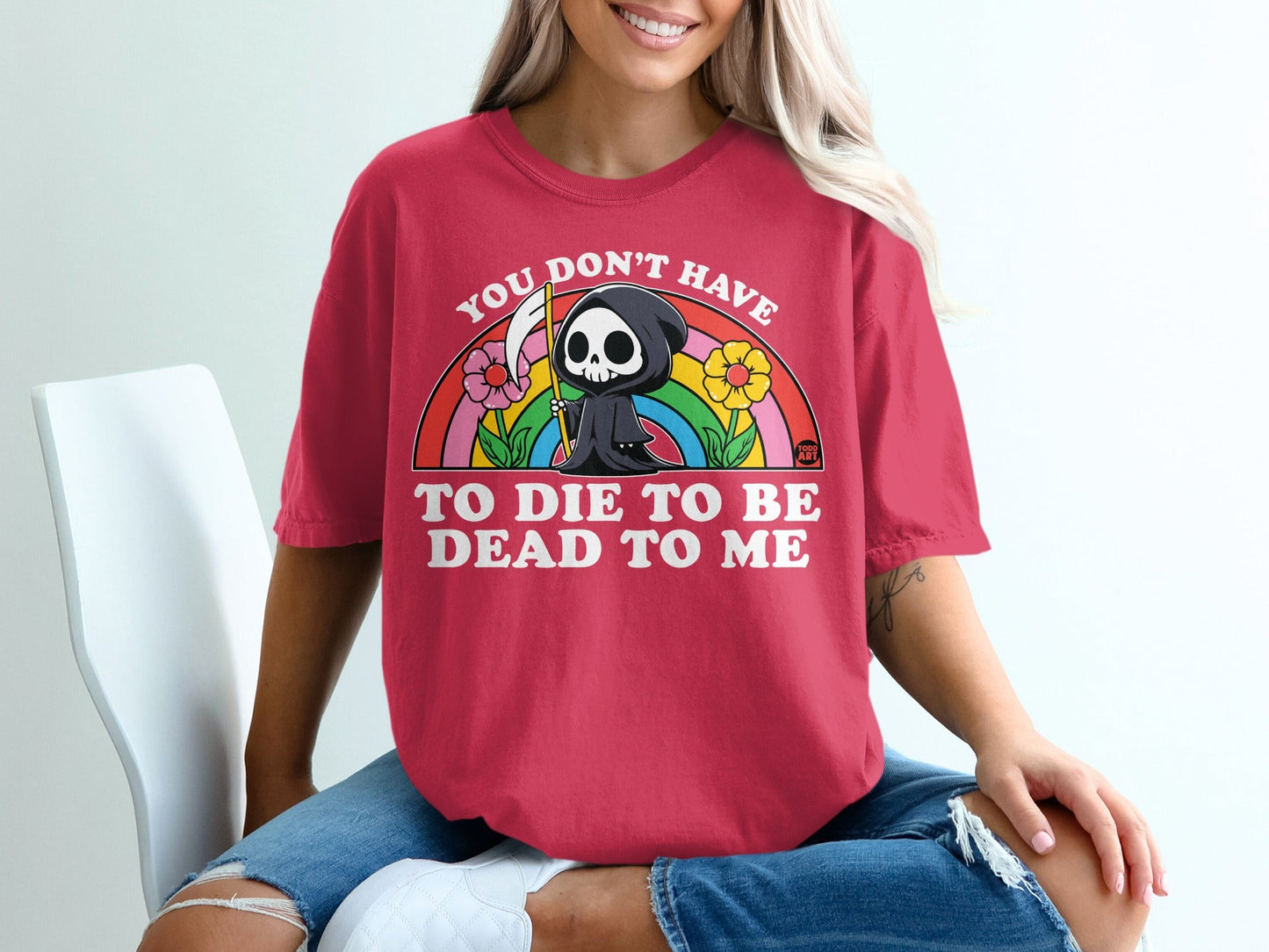 Red t-shirt with grim reaper, rainbow, and flowers, text "You don't have to die to be dead to me".