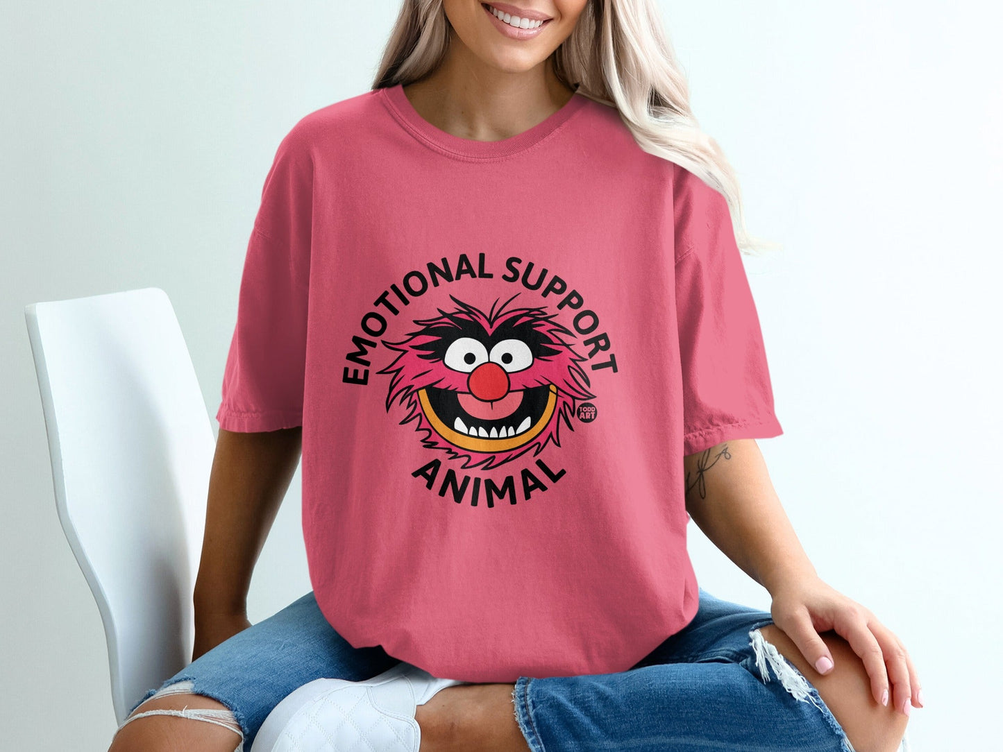 Pink t-shirt with Animal from The Muppets and "EMOTIONAL SUPPORT ANIMAL" text.