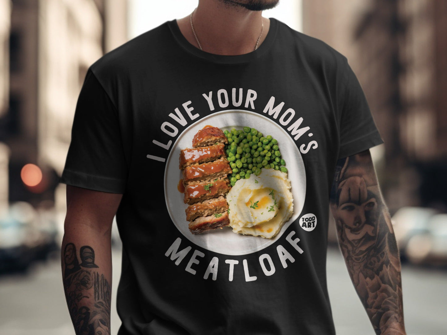 Black t-shirt with "I Love Your Mom's Meatloaf" design featuring a plate of meatloaf, mashed potatoes, and peas.