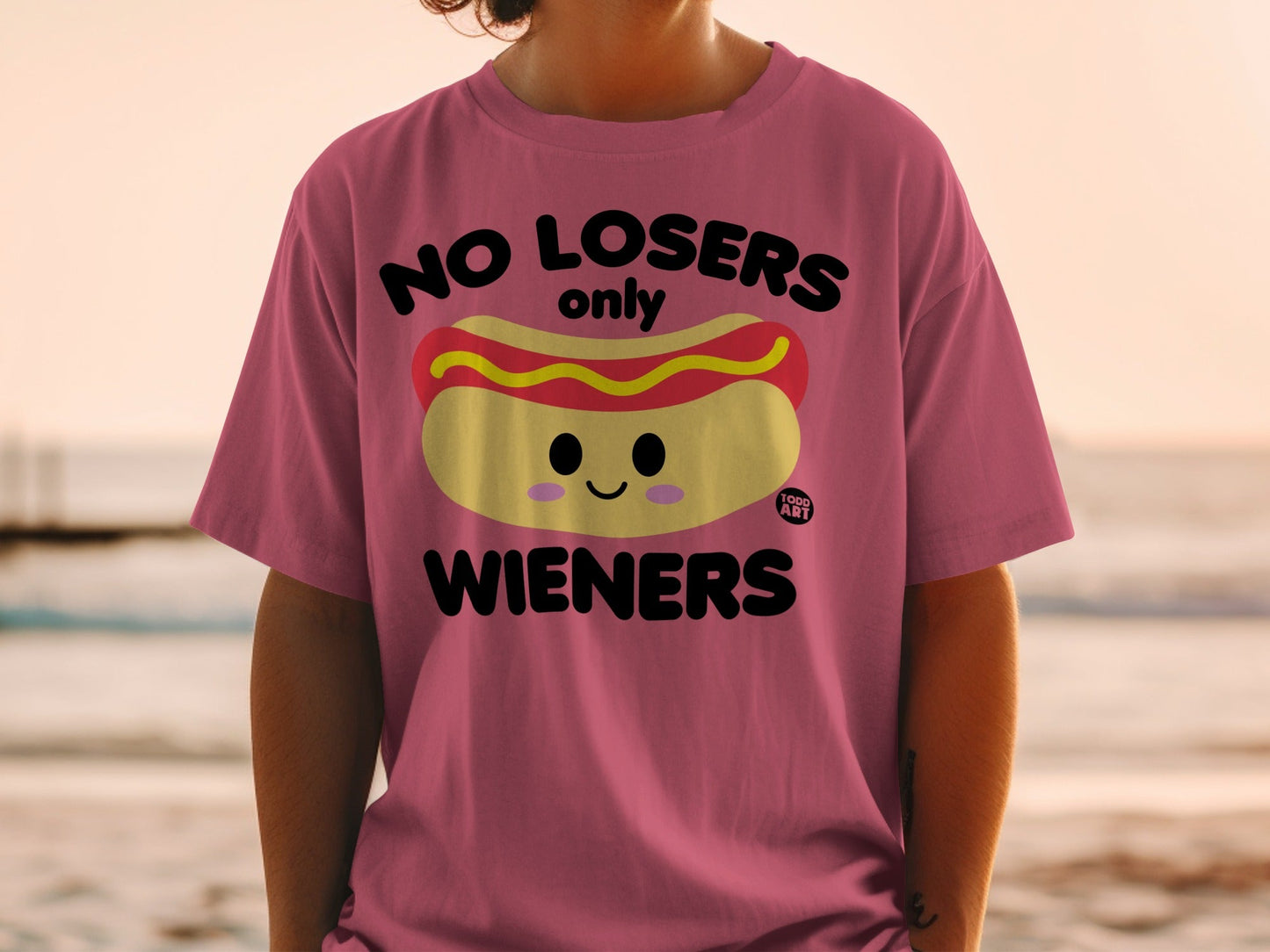 Pink t-shirt with "NO LOSERS only WIENERS" and hot dog graphic.