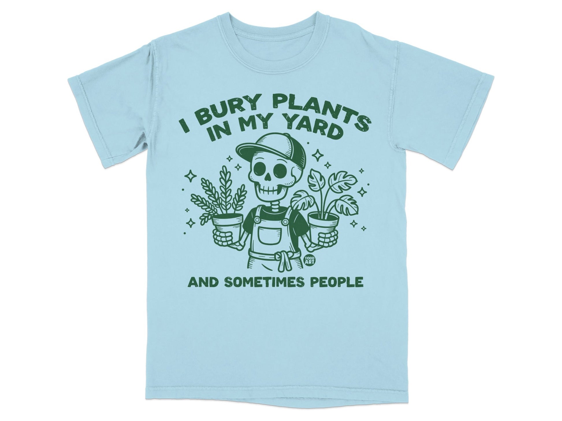 Light blue t-shirt with skeleton holding potted plants and text "I BURY PLANTS IN MY YARD AND SOMETIMES PEOPLE".
