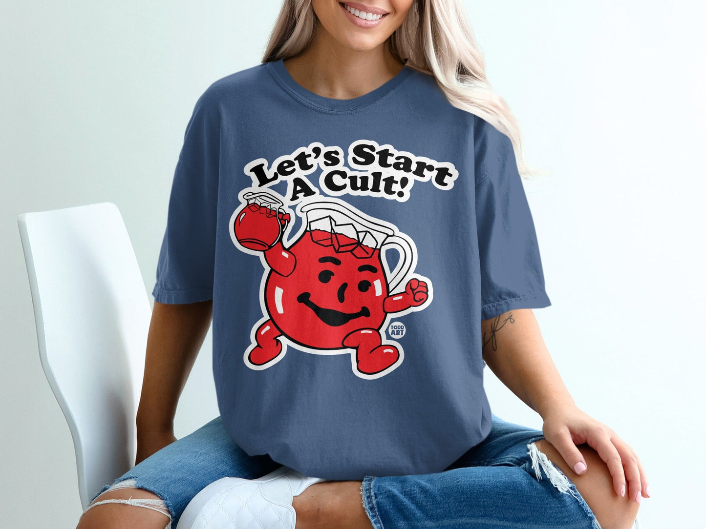 Kool-Aid Man character holding a pitcher with "Let's Start A Cult!" text.