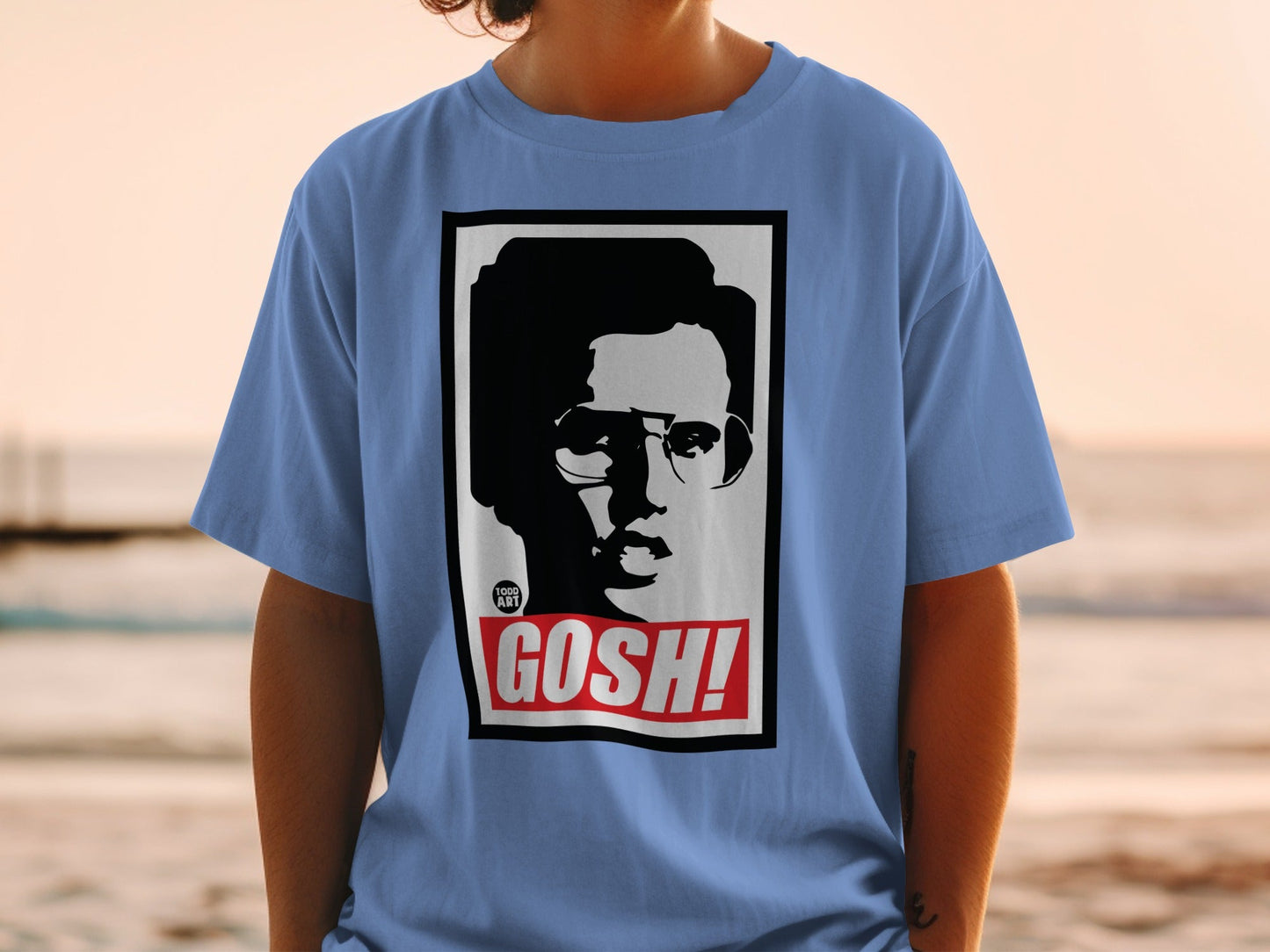 T-shirt with black and white portrait, glasses, and red "GOSH!" text.