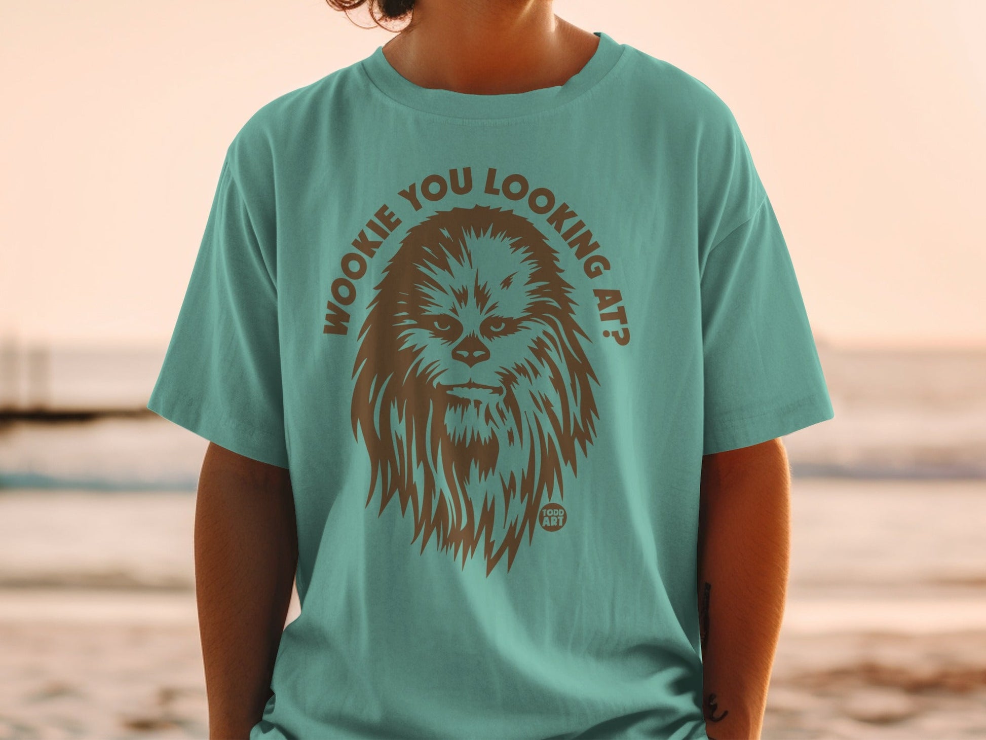 Teal t-shirt with Chewbacca graphic and "Wookiee you looking at?" text.