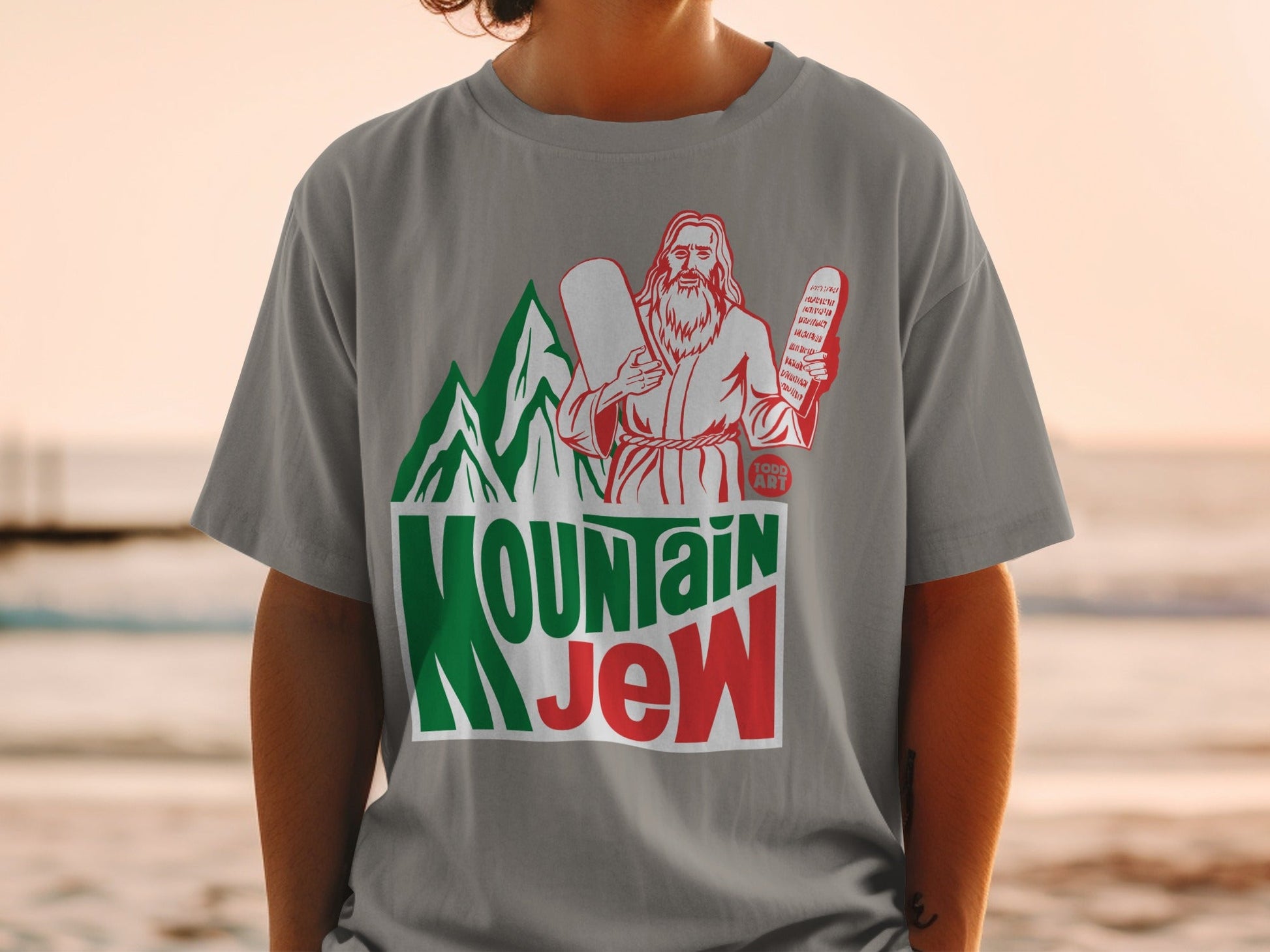Gray t-shirt with "Mountain Jew" text and Jesus holding tablets.