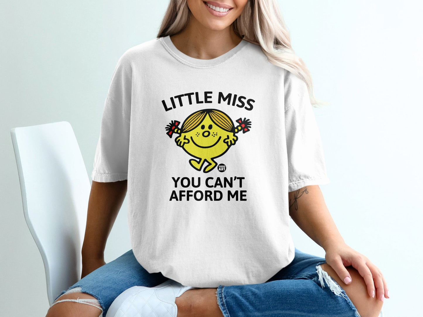 White t-shirt with "Little Miss You Can't Afford Me" graphic.