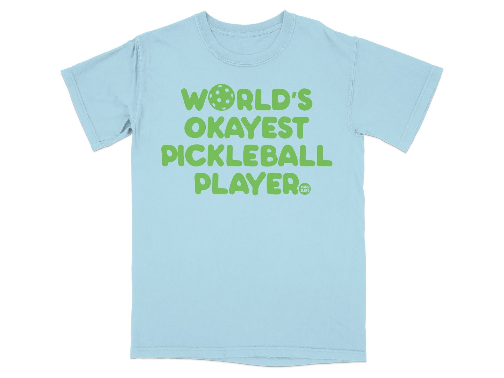 Light blue t-shirt with green text "WORLD'S OKAYEST PICKLEBALL PLAYER".
