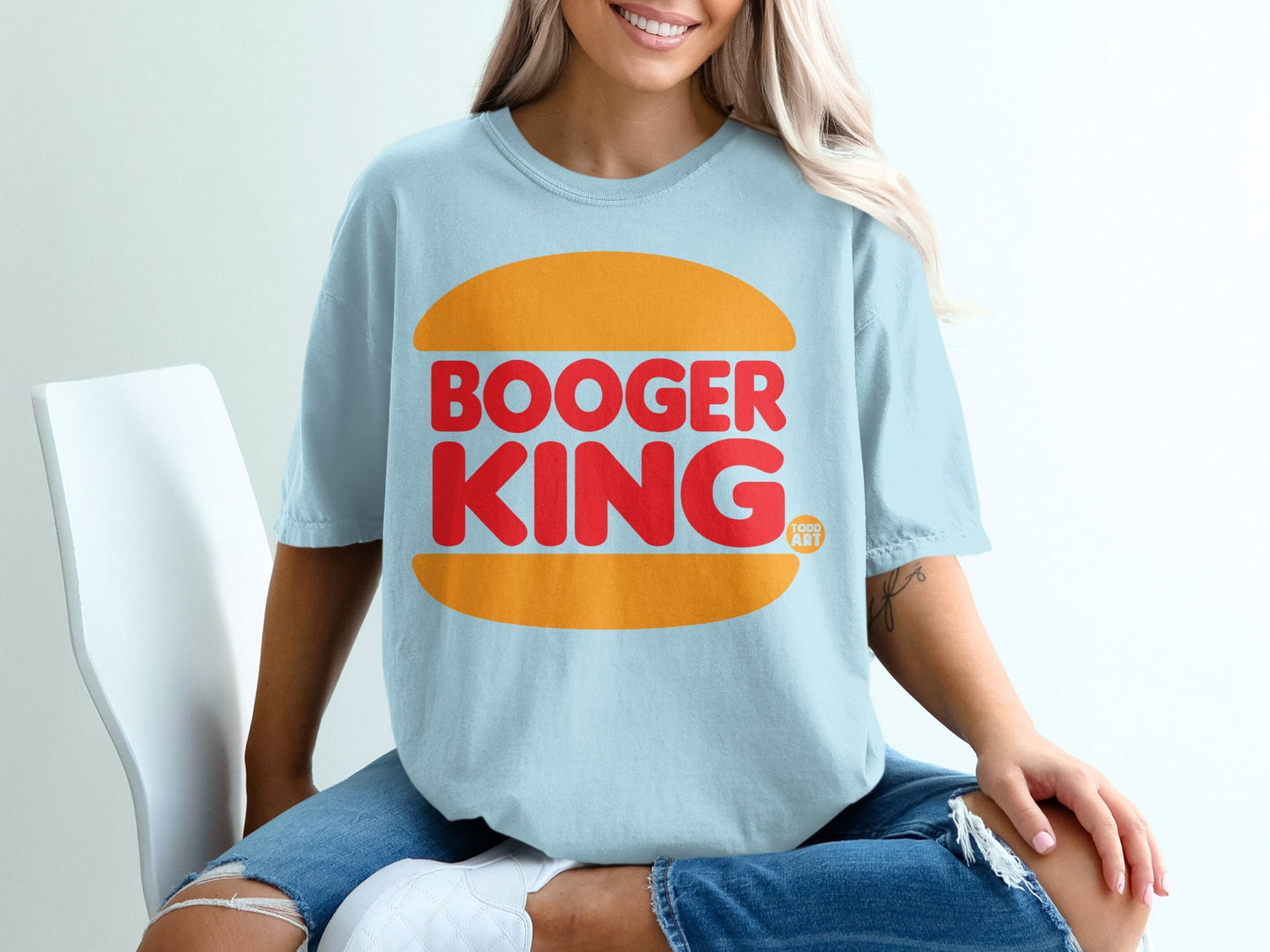 Light blue t-shirt with "BOOGER KING" logo in orange and red.