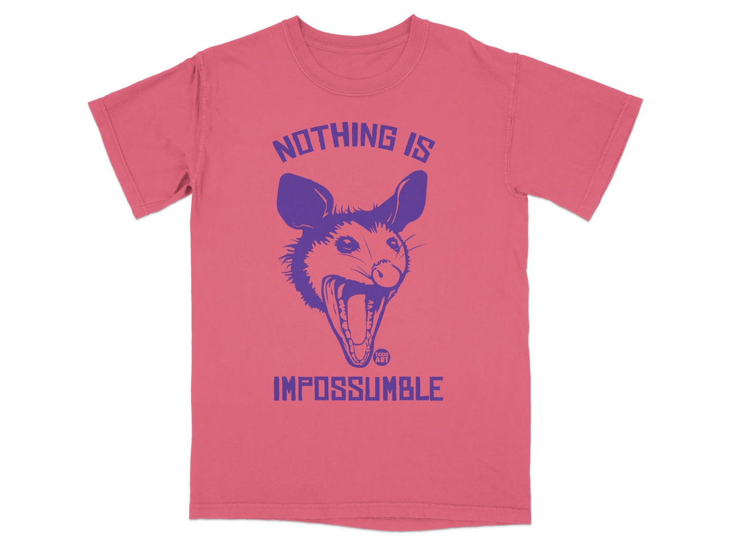 Pink t-shirt with a purple possum graphic and text "NOTHING IS IMPOSSIBLE".