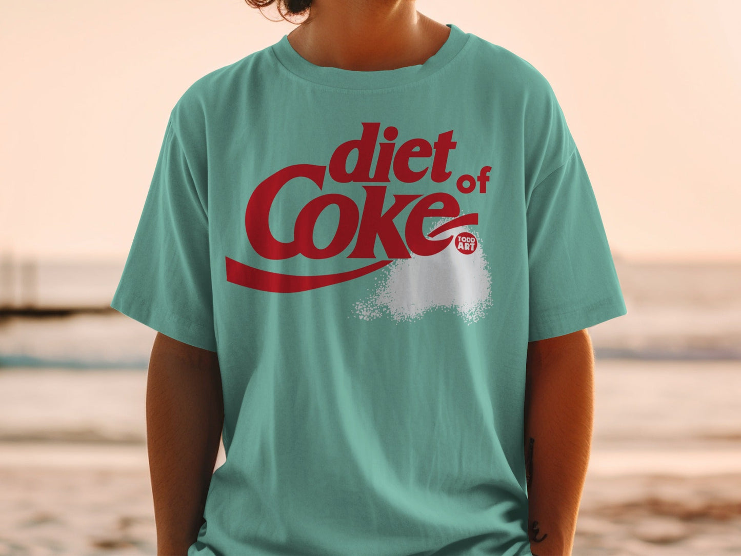 Teal t-shirt with Diet Coke logo and sugar pile graphic.