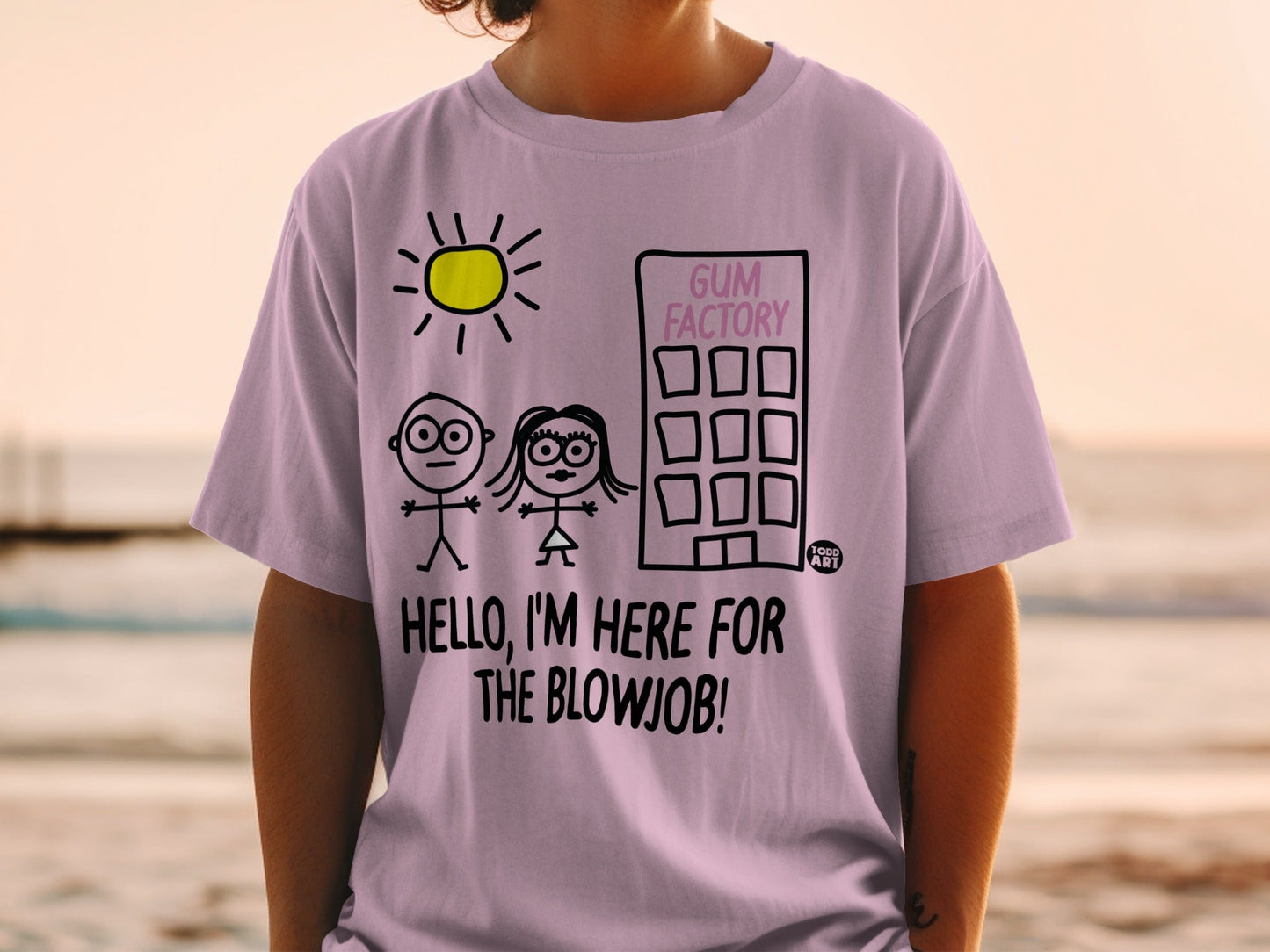 T-shirt with stick figures and "GUM FACTORY" building, text "HELLO, I'M HERE FOR THE BLOWJOB!".