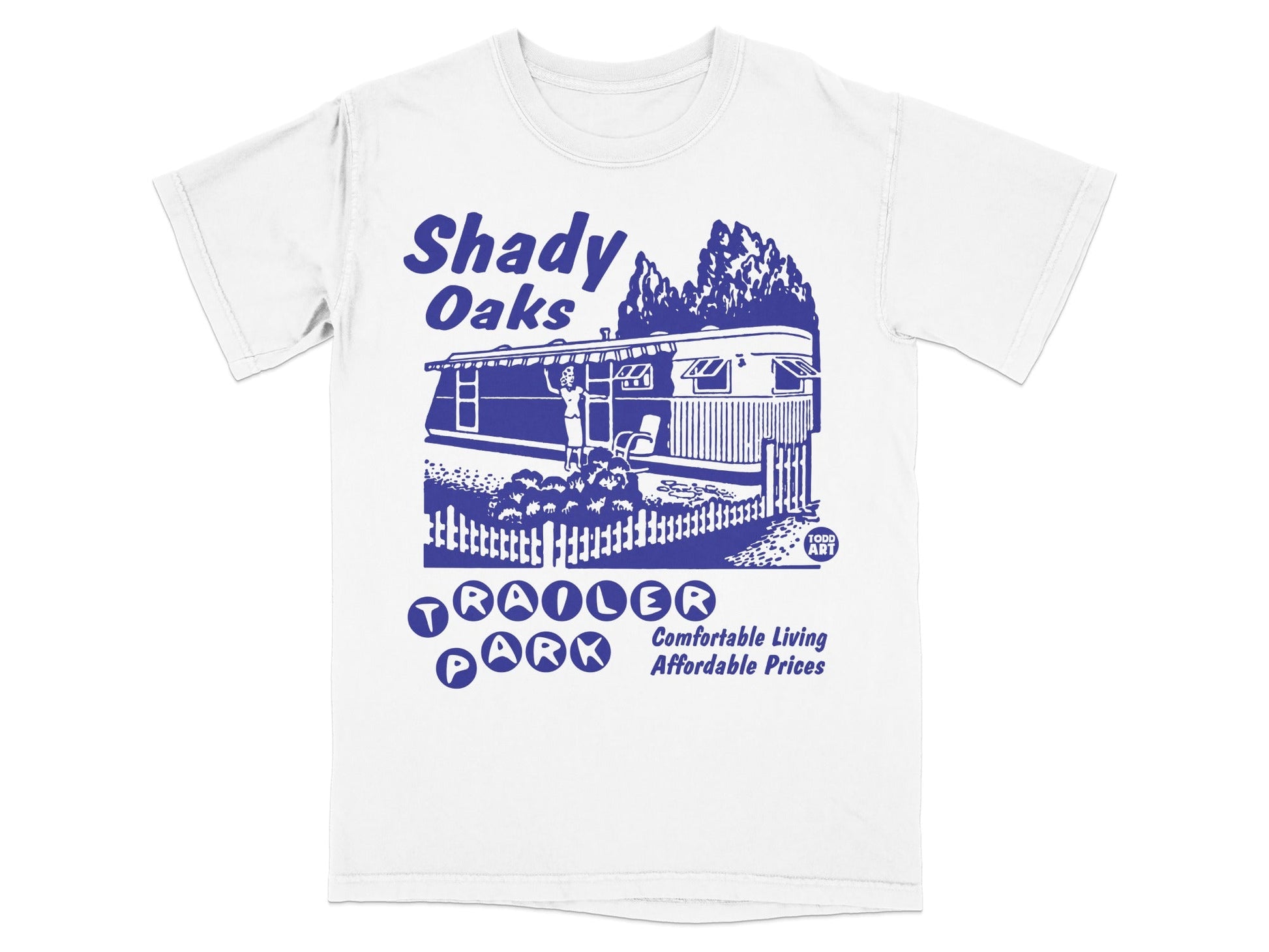 White t-shirt with blue graphic of a trailer park and text "Shady Oaks Trailer Park Affordable Prices".