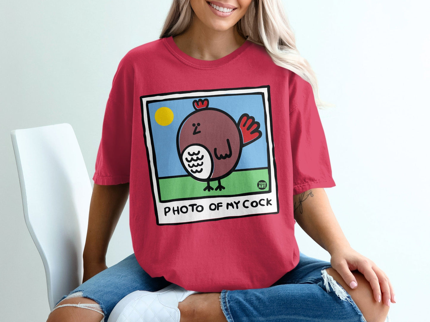 Red t-shirt with cartoon chicken illustration and text "PHOTO OF MY COCK".
