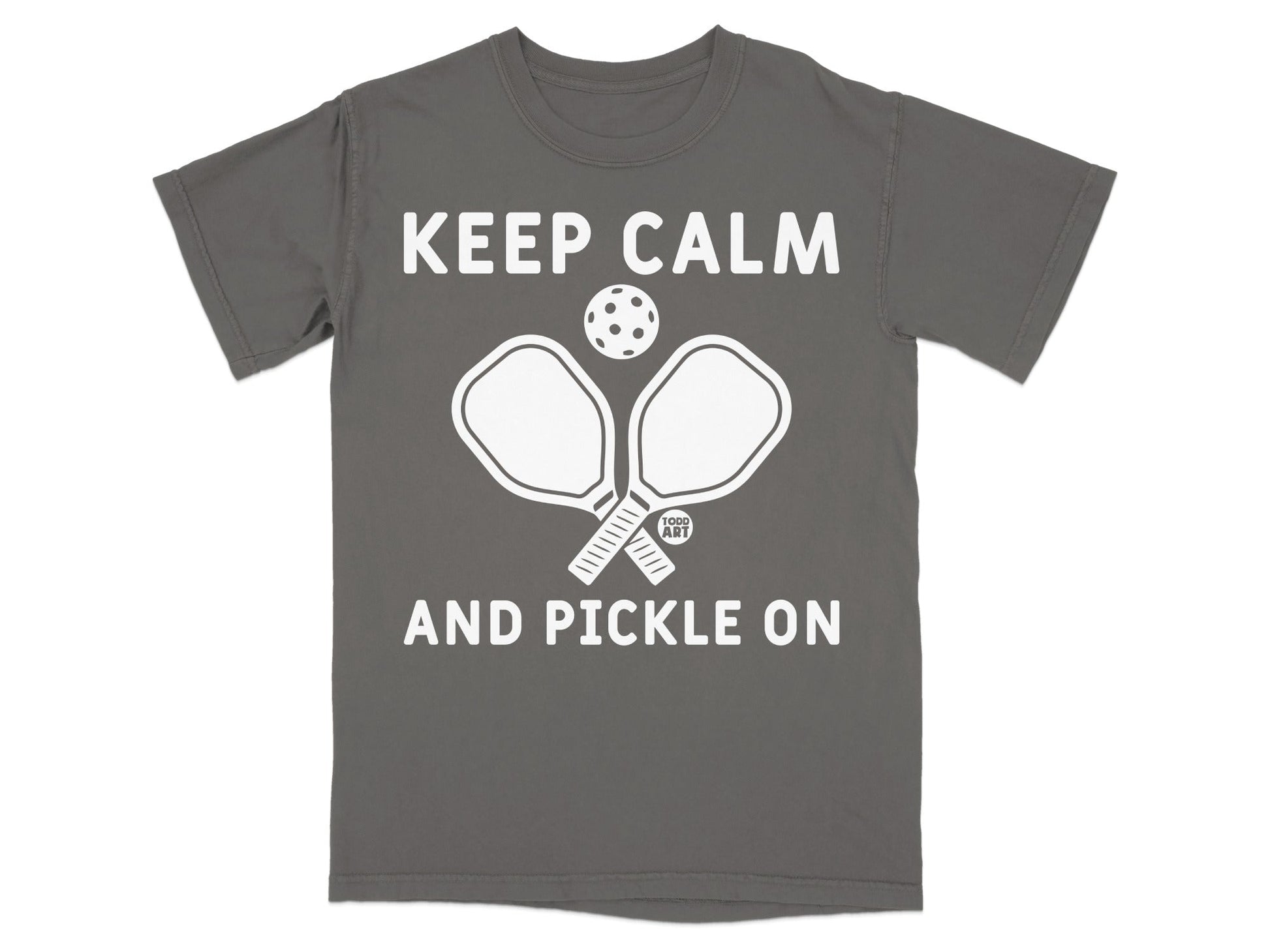 Gray t-shirt with "KEEP CALM AND PICKLE ON" text and pickleball paddles.