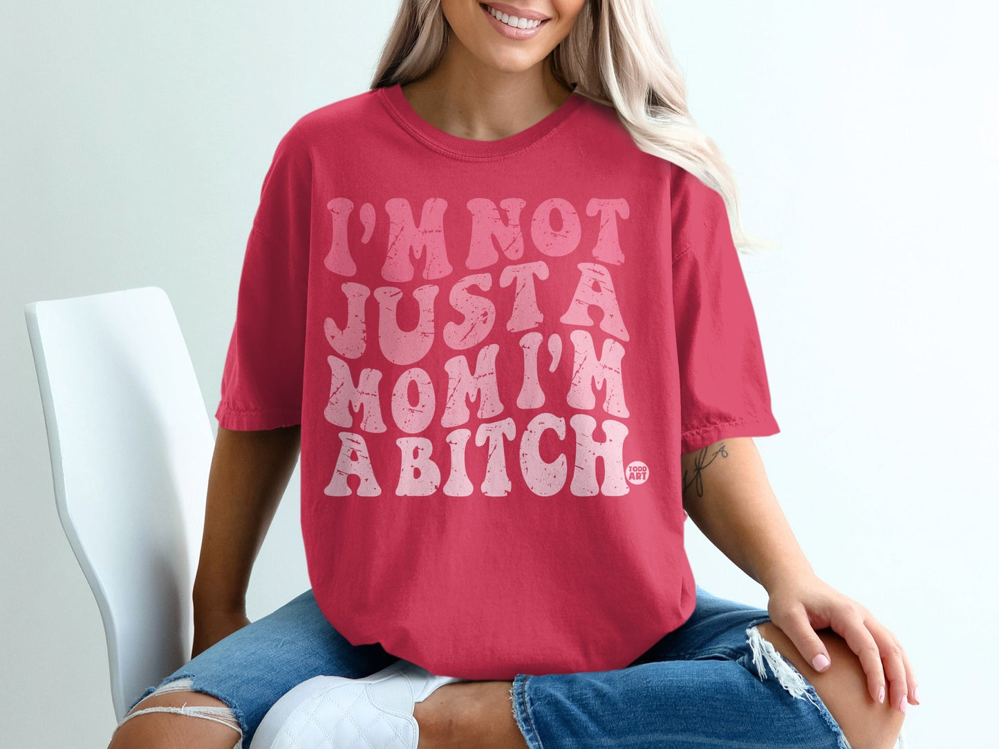 Red t-shirt with pink text "I'M NOT JUST A MOM I'M A BITCH".