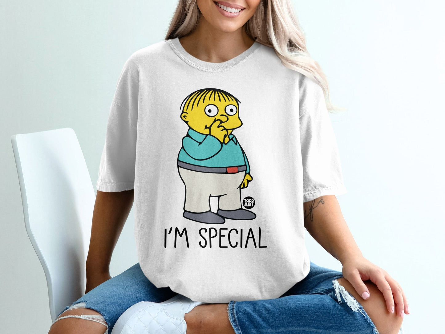 Ralph Wiggum from The Simpsons cartoon character on a white t-shirt.
