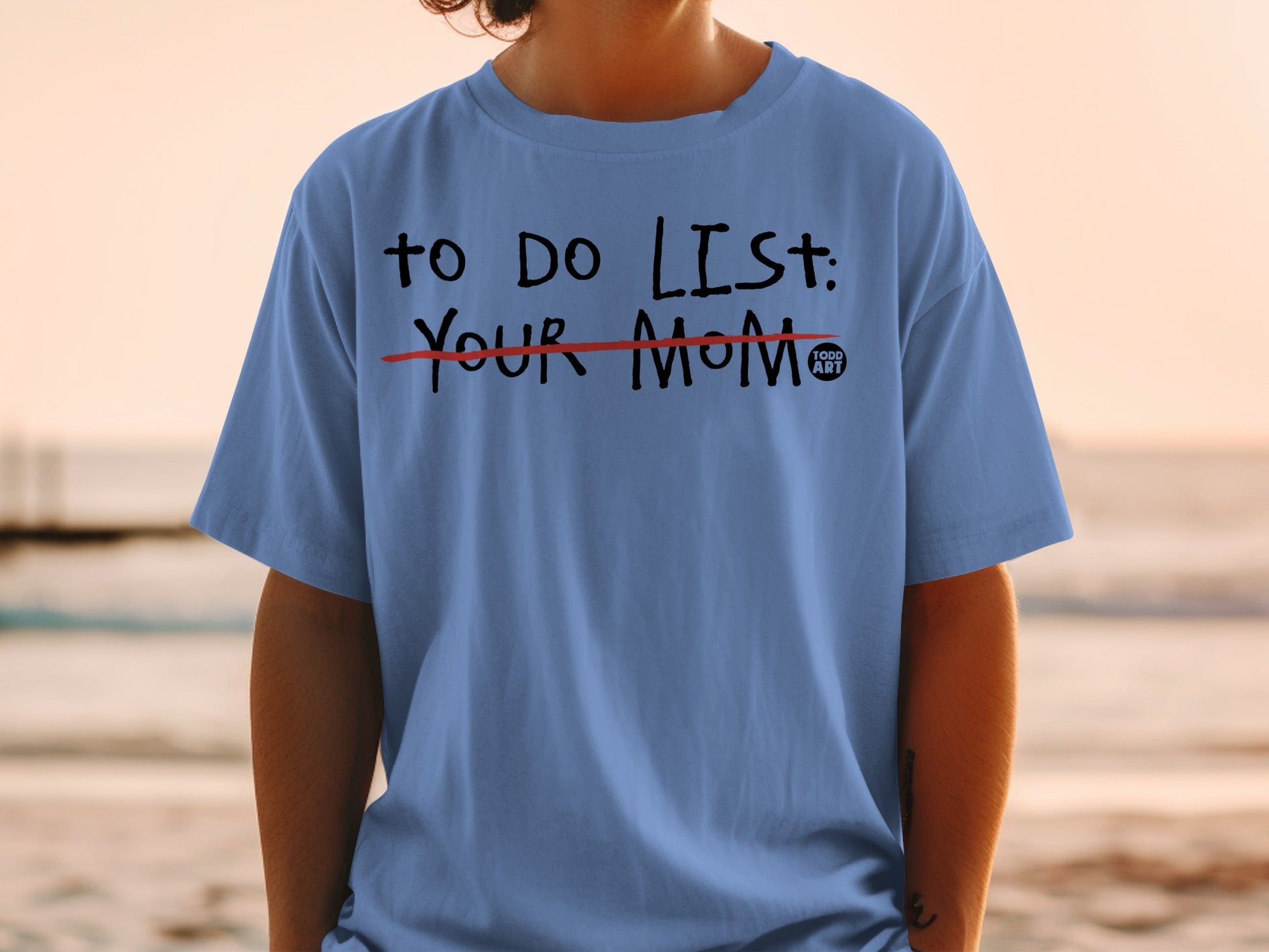 Blue t-shirt with "TO DO LIST: YOUR MOM" printed in black and red.