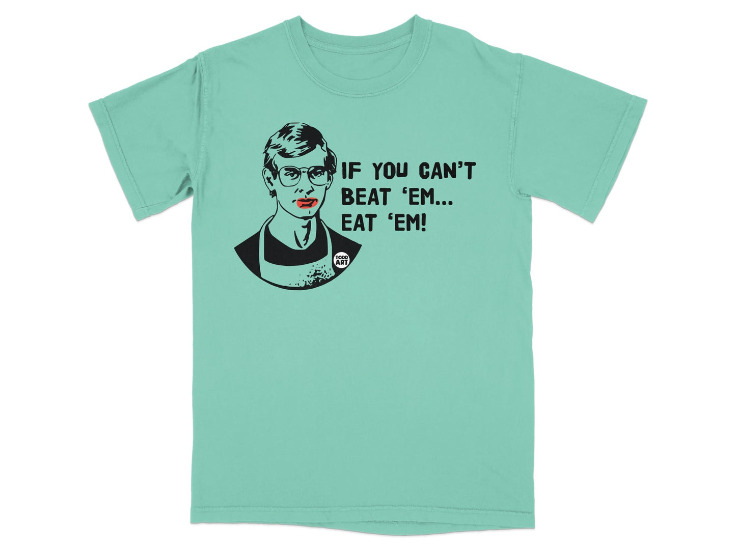 T-shirt with a stylized drawing of a man with red lips, text reads "IF YOU CAN'T BEAT 'EM... EAT 'EM!".