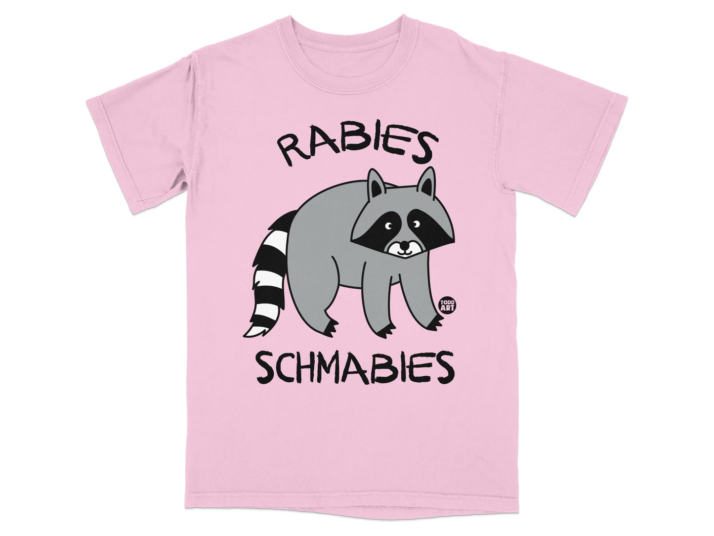 Pink t-shirt with raccoon graphic and text "RABIES SCHMABIES".